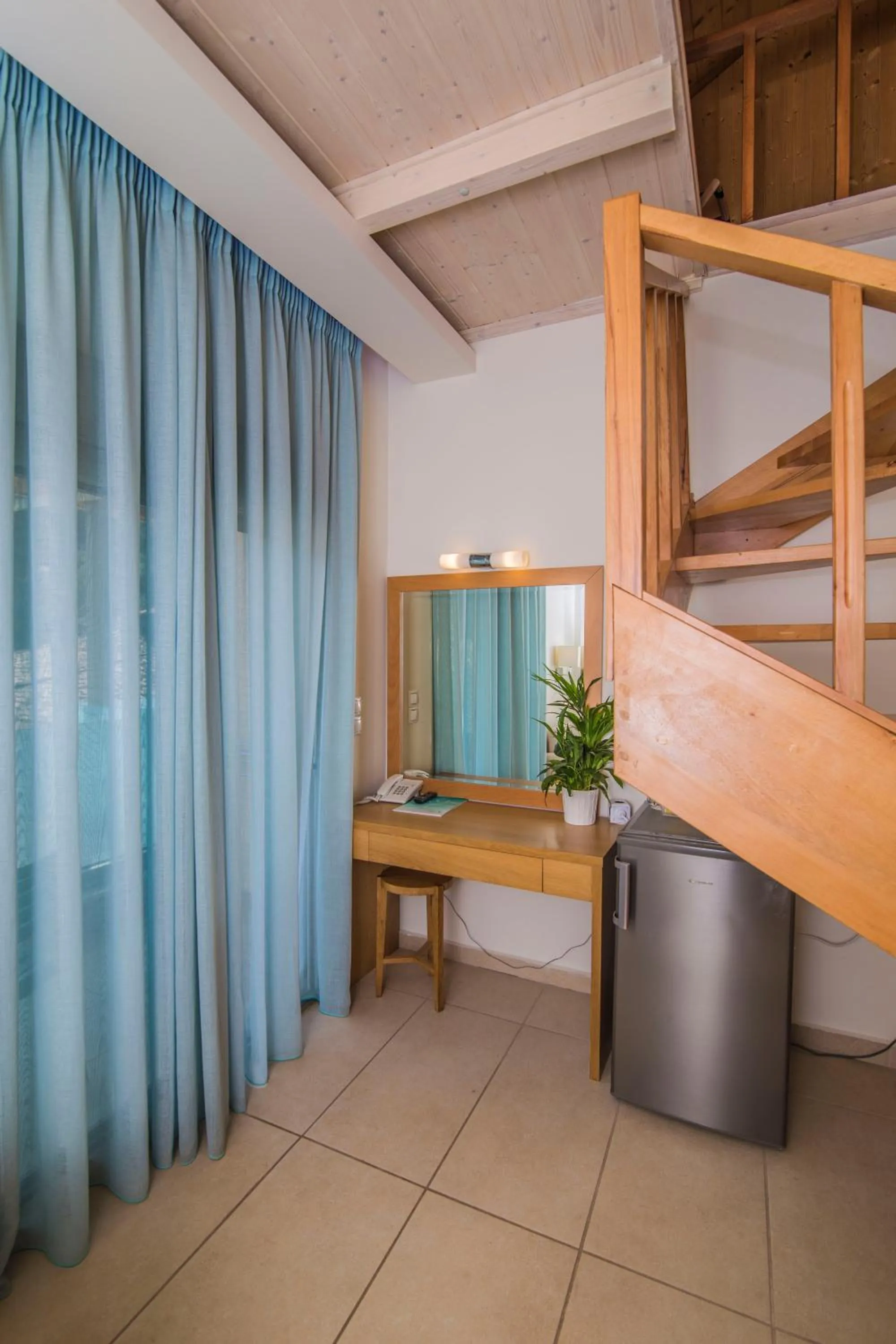 Bed in Grand TheoNi Boutique Hotel & Spa