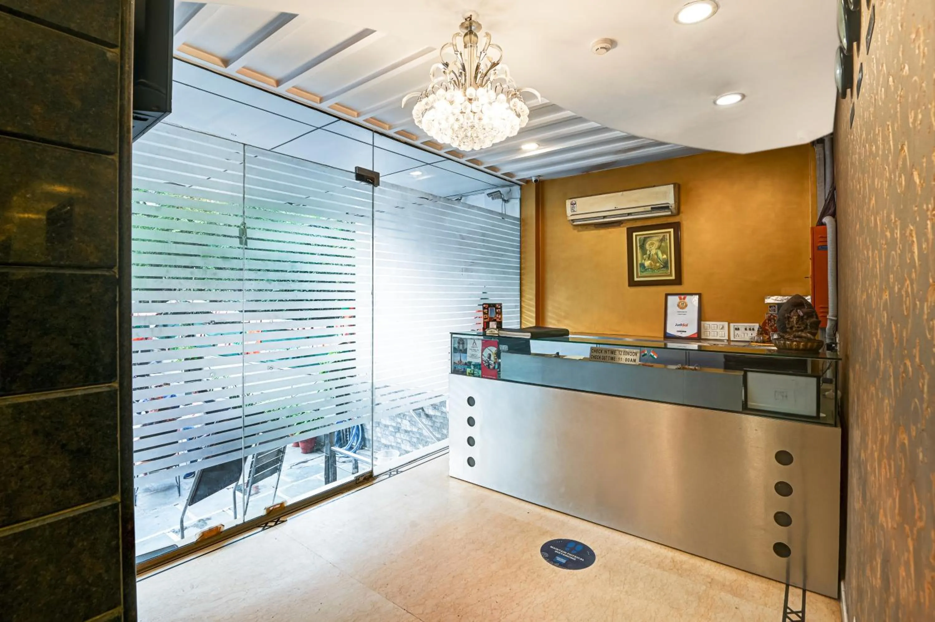 Lobby or reception in Hotel Amby Inn by Quadis - Lajpat Nagar