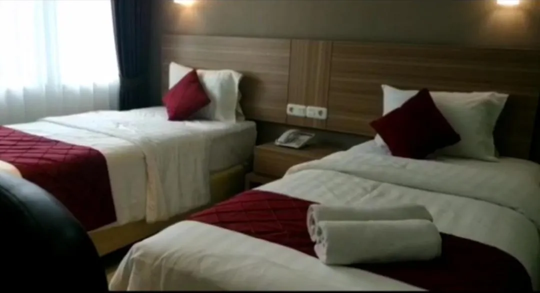 Bed in Sunshine Family Homestay near Terminal 1 Juanda Airport