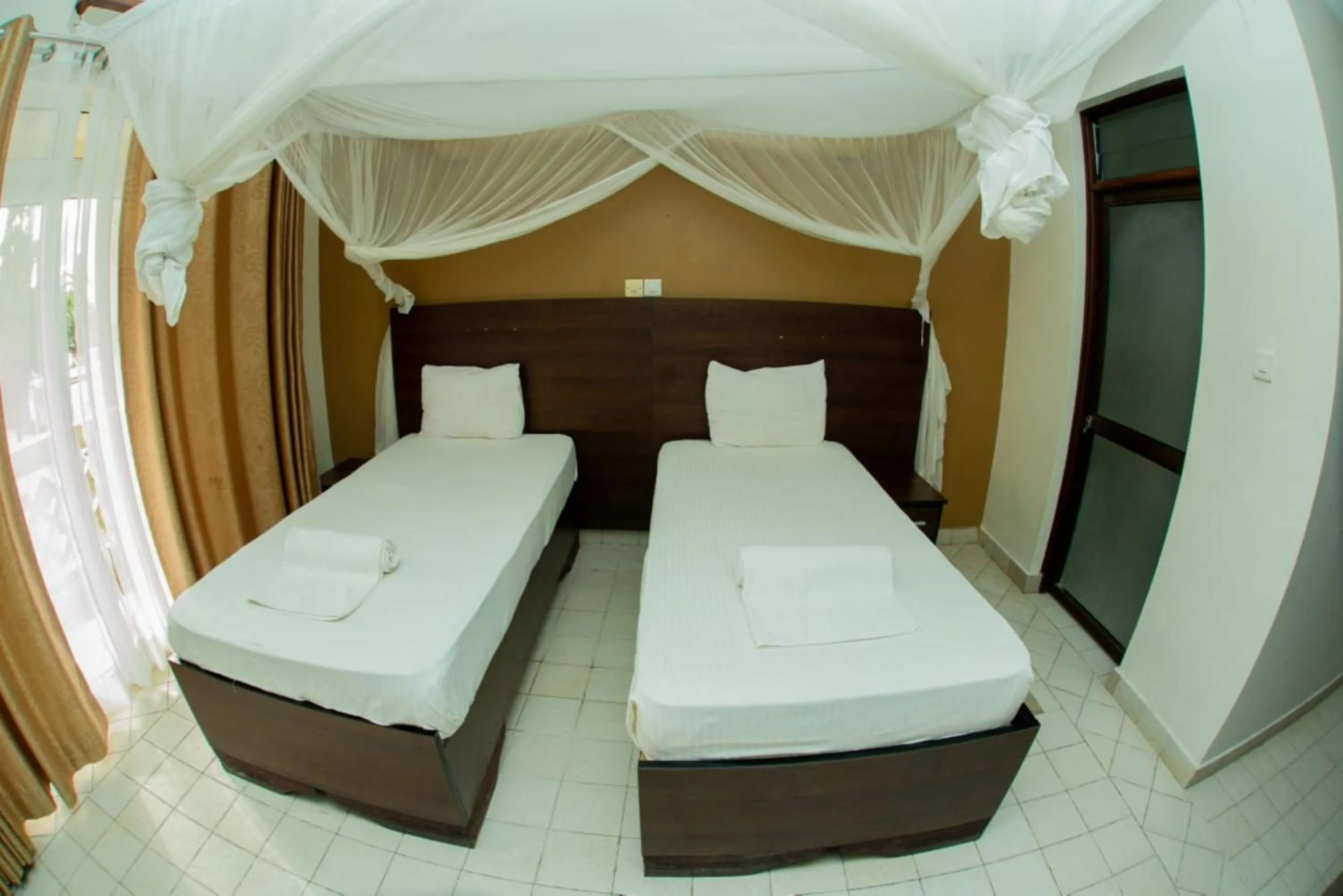 Bed in Gasaro Hotel