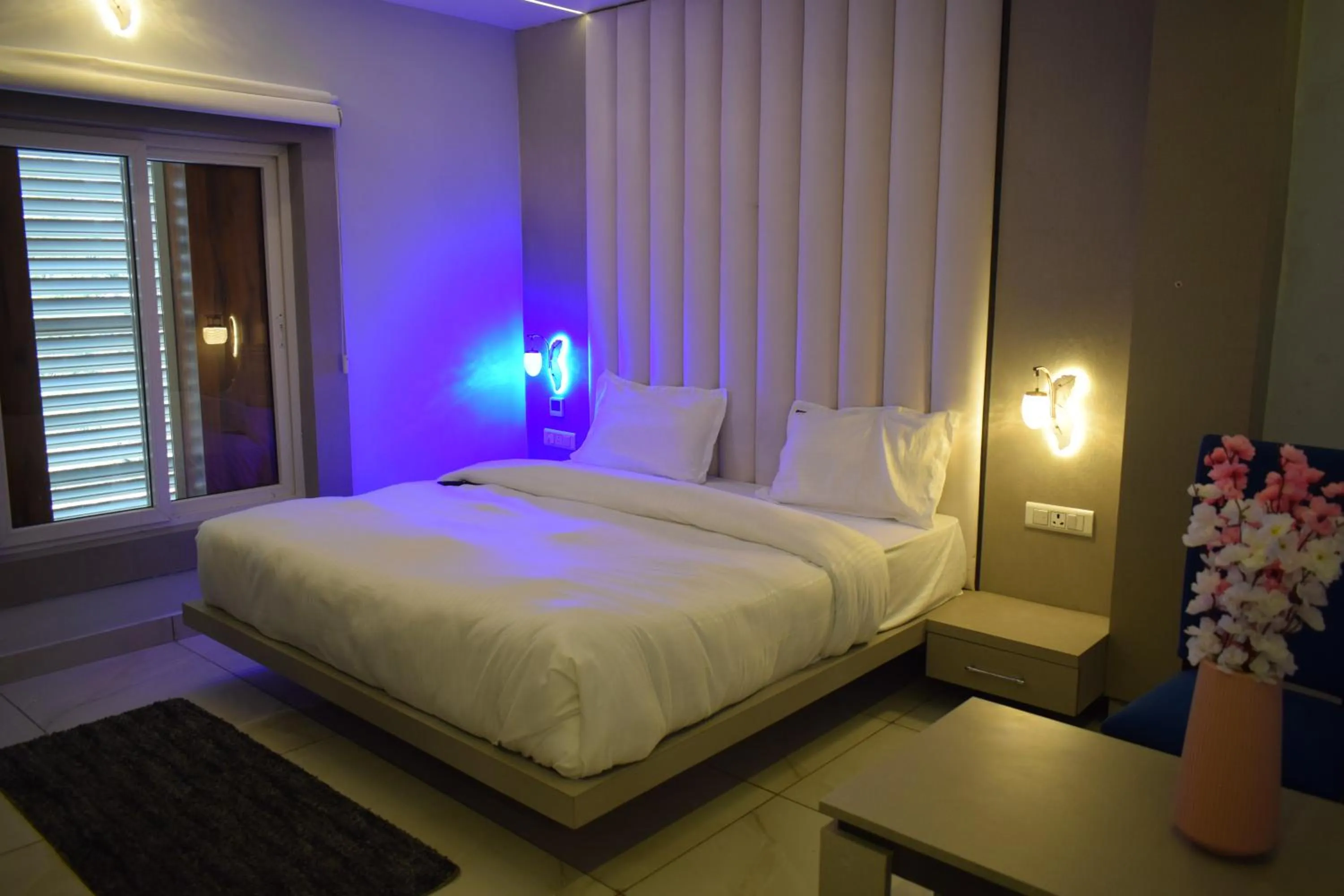Bedroom, Bed in Country Ambience Hotel By Jags City Mall