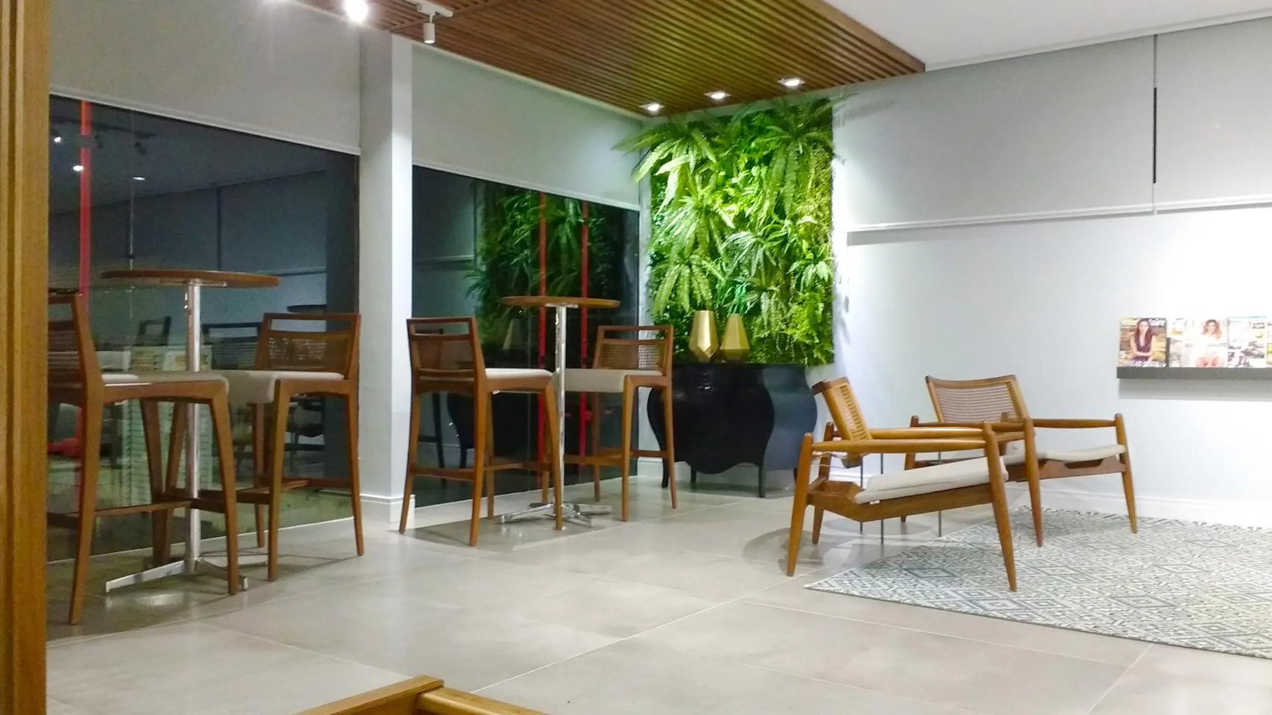 Communal lounge/ TV room in Tri Hotel Smart Chapecó