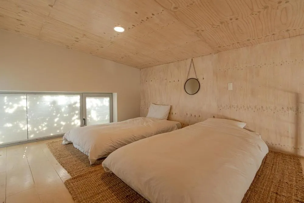 Bed in Jeju Mooi Pension