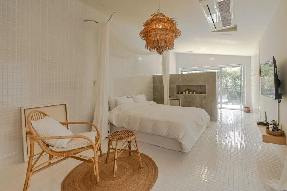 Bed in Jeju Mooi Pension