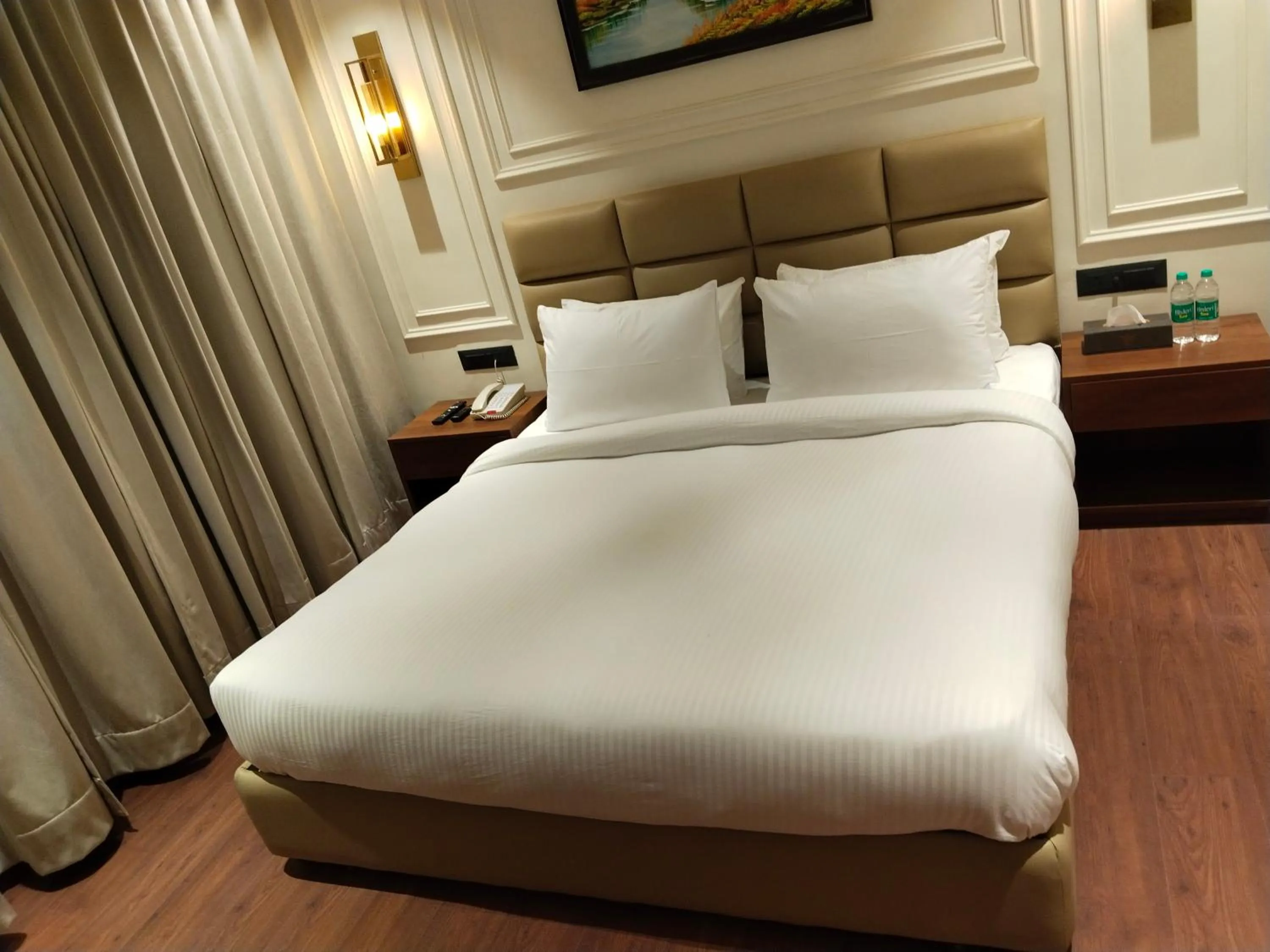 Bed in The Royal Velvet Hotel & Resort