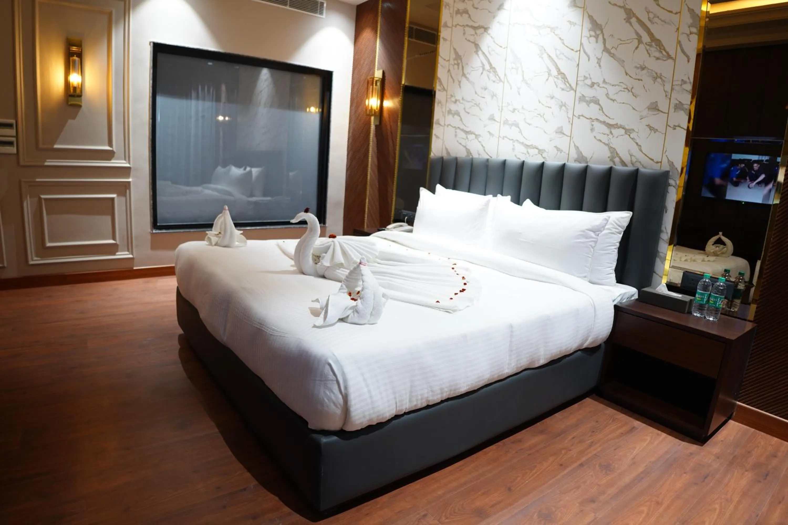 Bed in The Royal Velvet Hotel & Resort