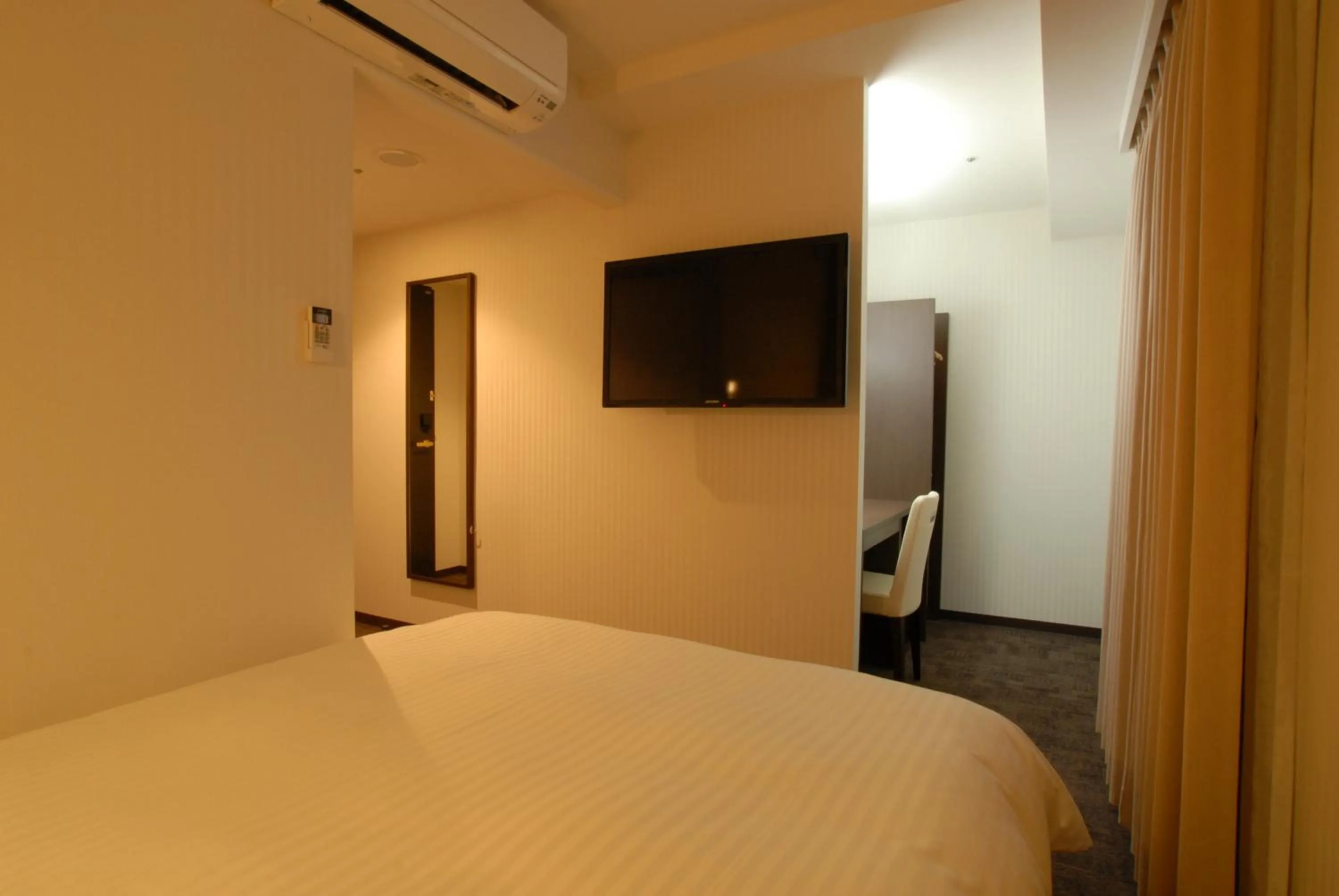 Bed in AB Hotel Kanazawa