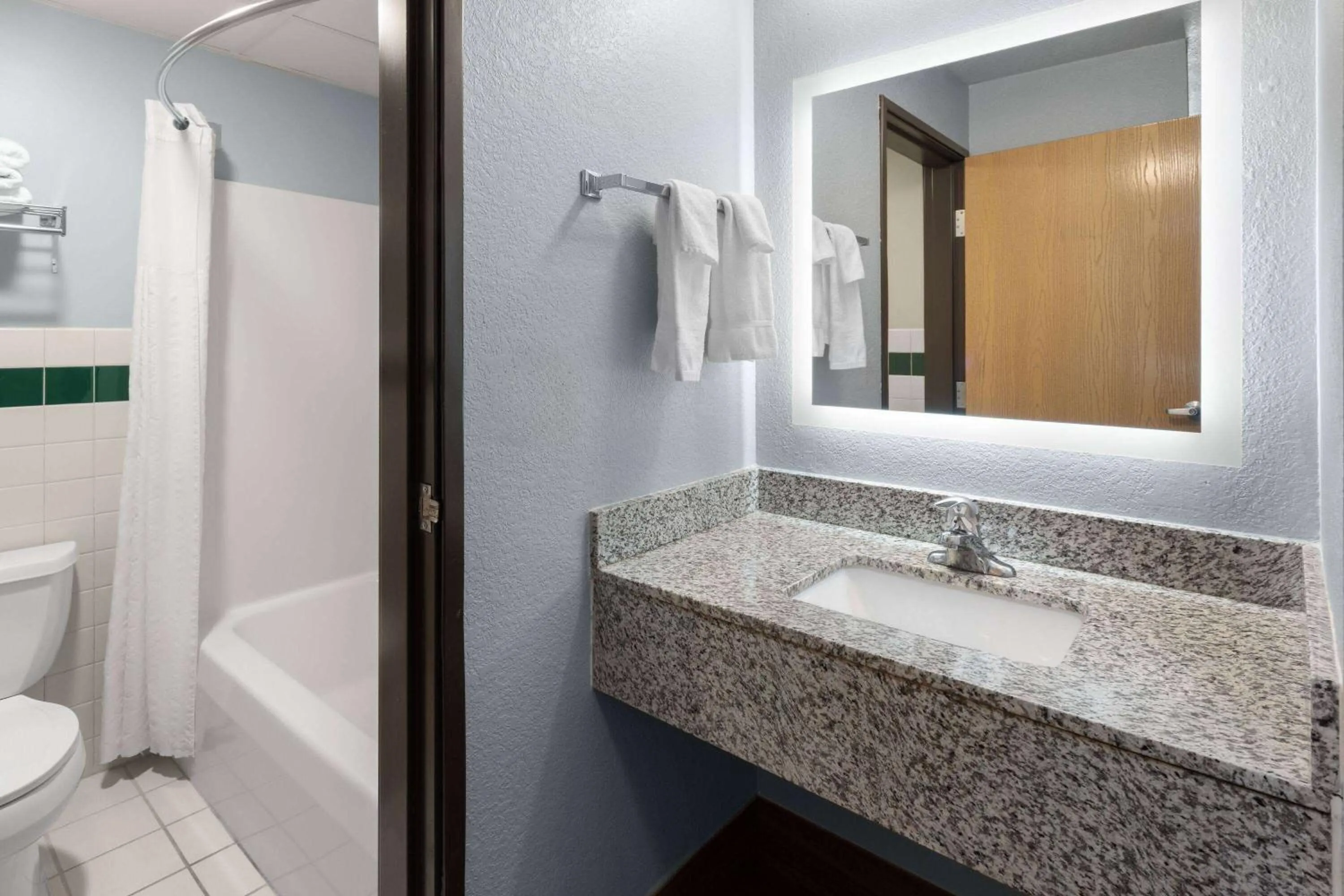 Bathroom in AmericInn by Wyndham Oscoda Near AuSable River