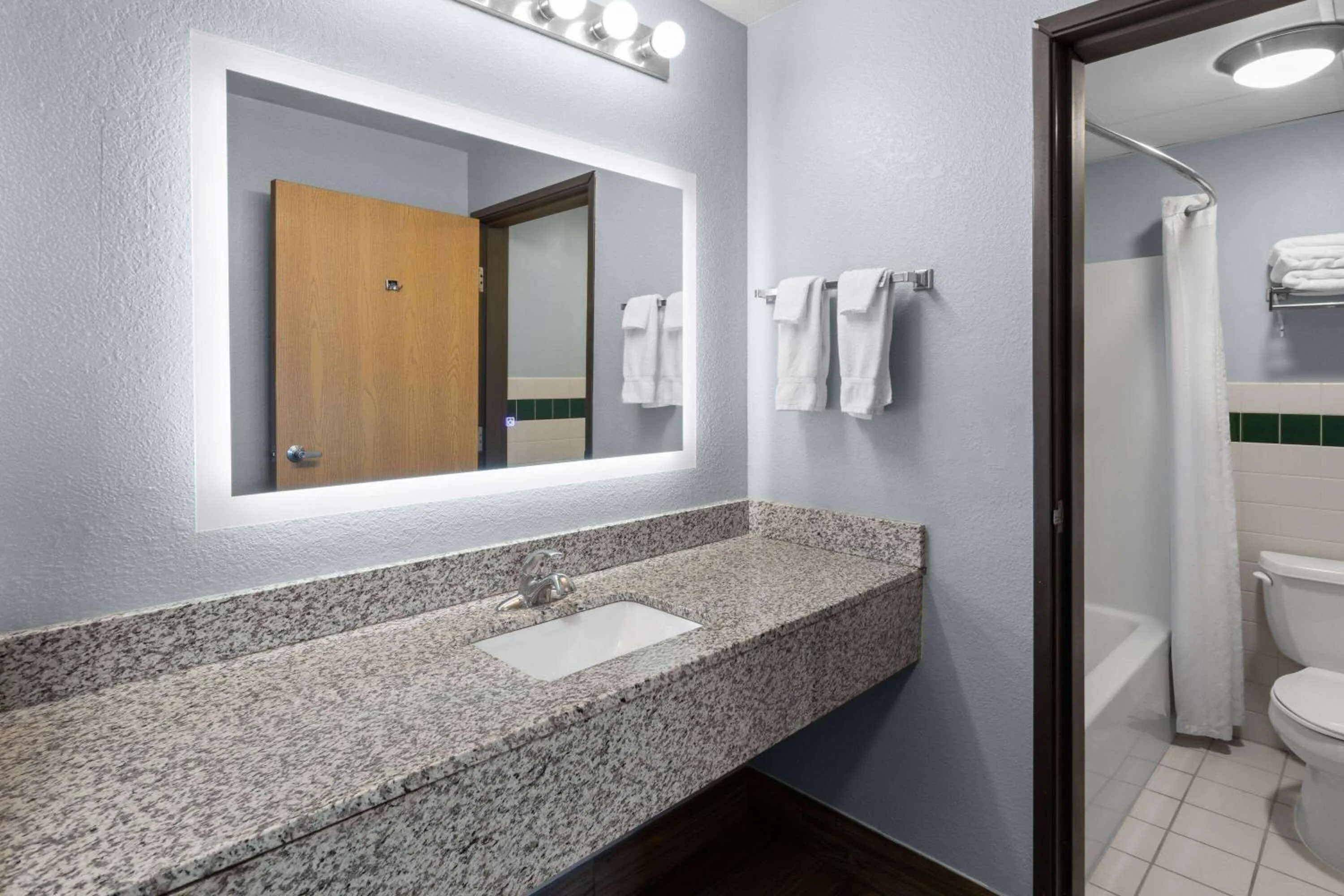 Bathroom in AmericInn by Wyndham Oscoda Near AuSable River