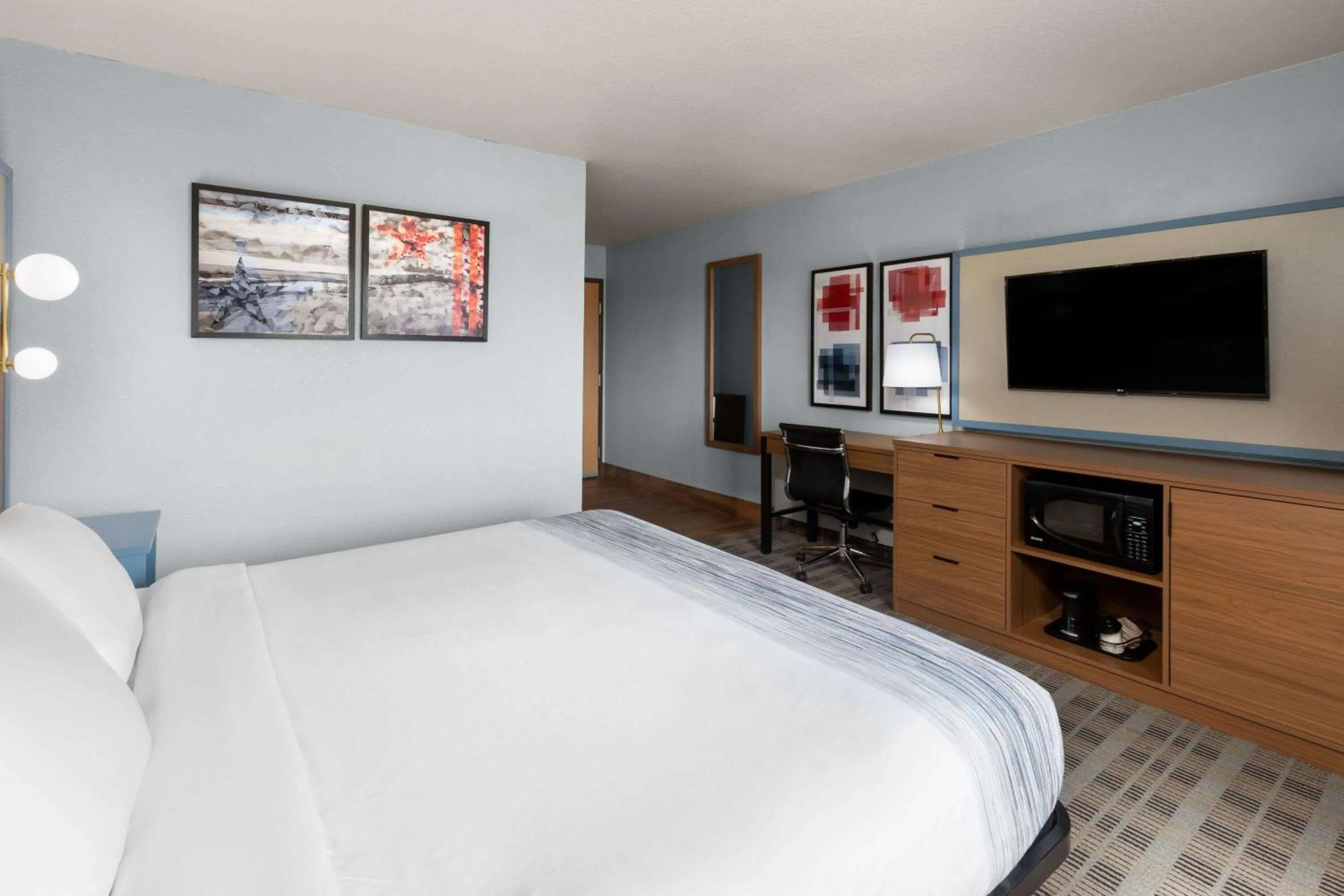 Photo of the whole room, Bed in AmericInn by Wyndham Oscoda Near AuSable River
