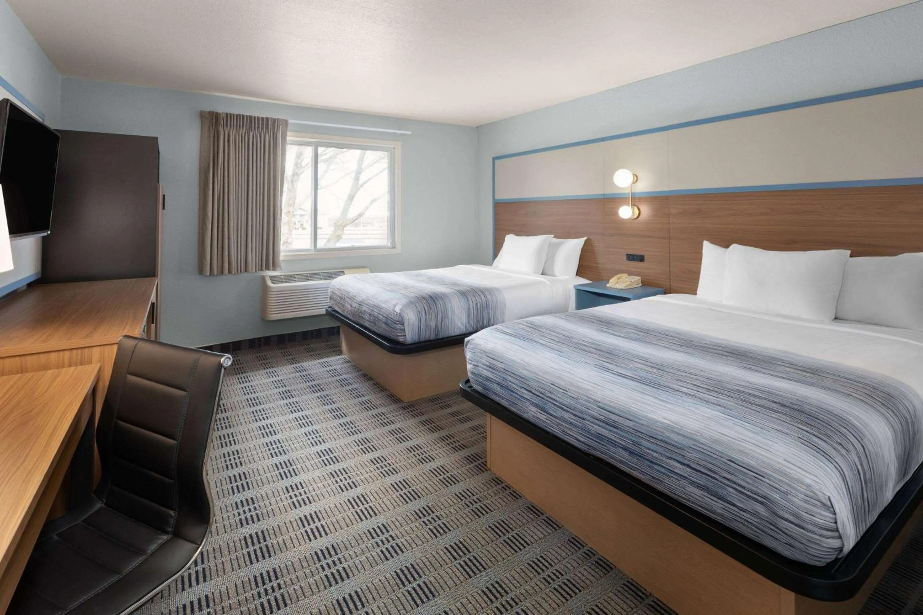 Photo of the whole room, Bed in AmericInn by Wyndham Oscoda Near AuSable River
