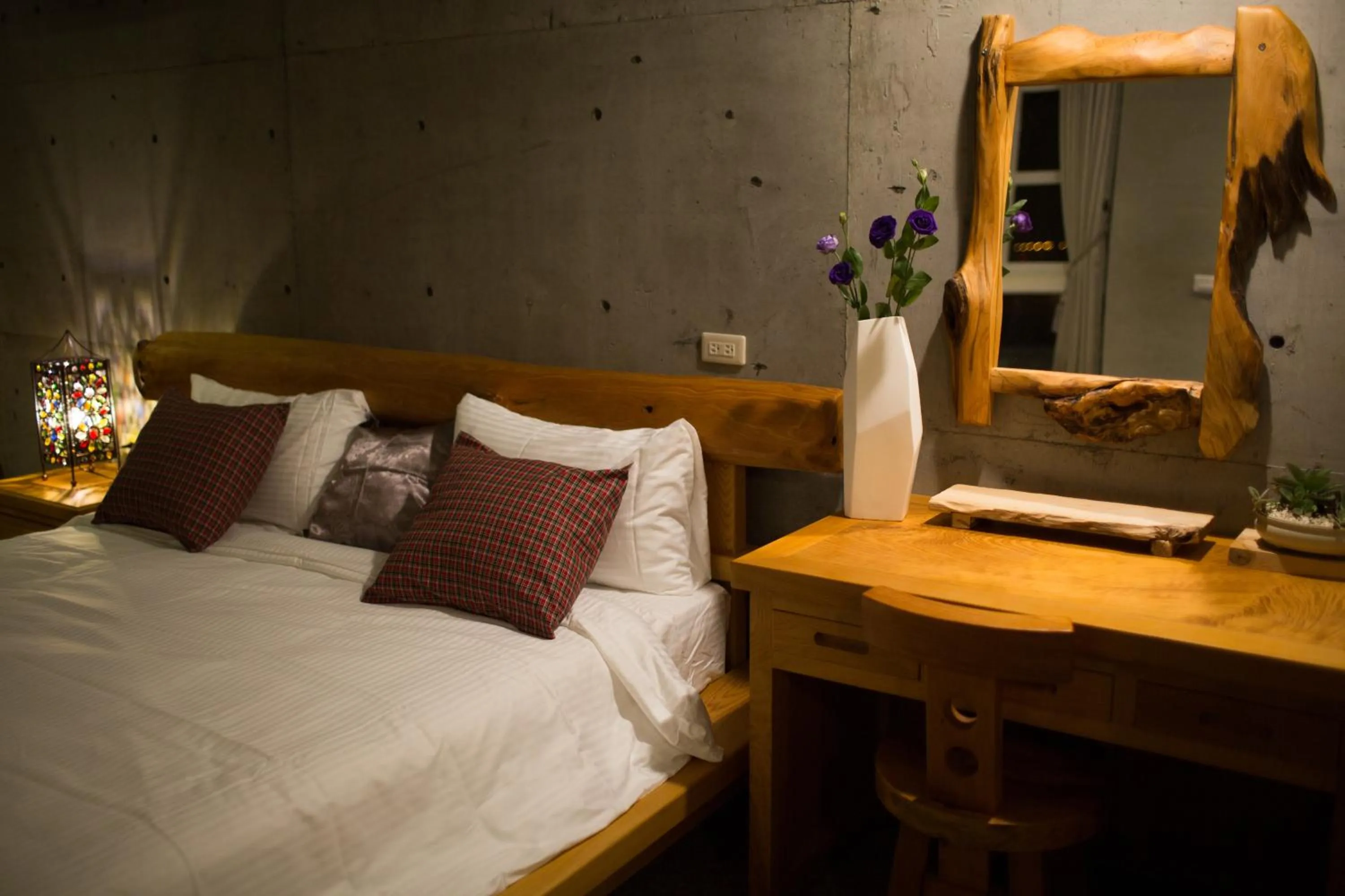 Bed in Water Reflections at Ease