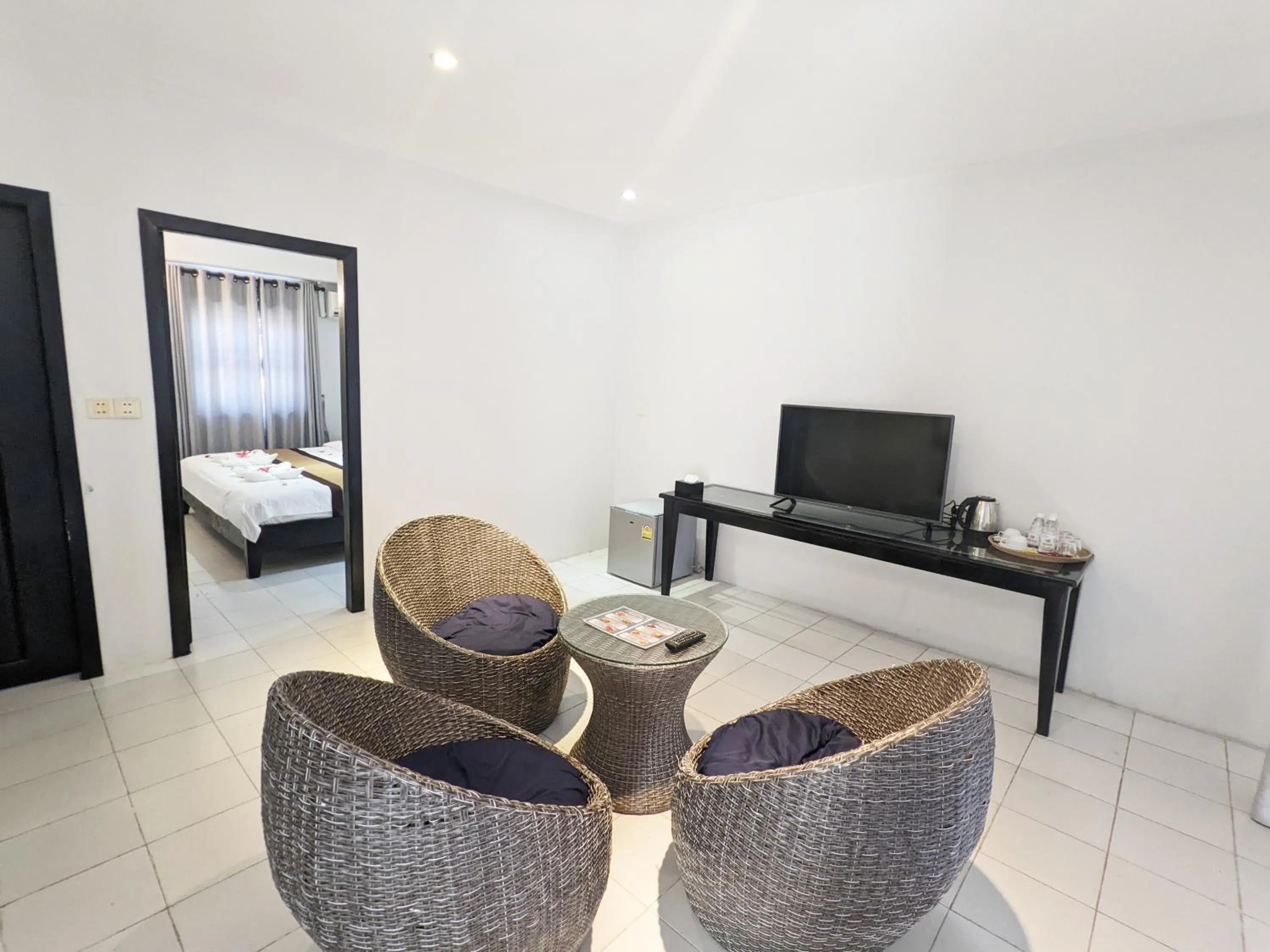 Seating area, Bed in Mary Beach Hotel & Resort