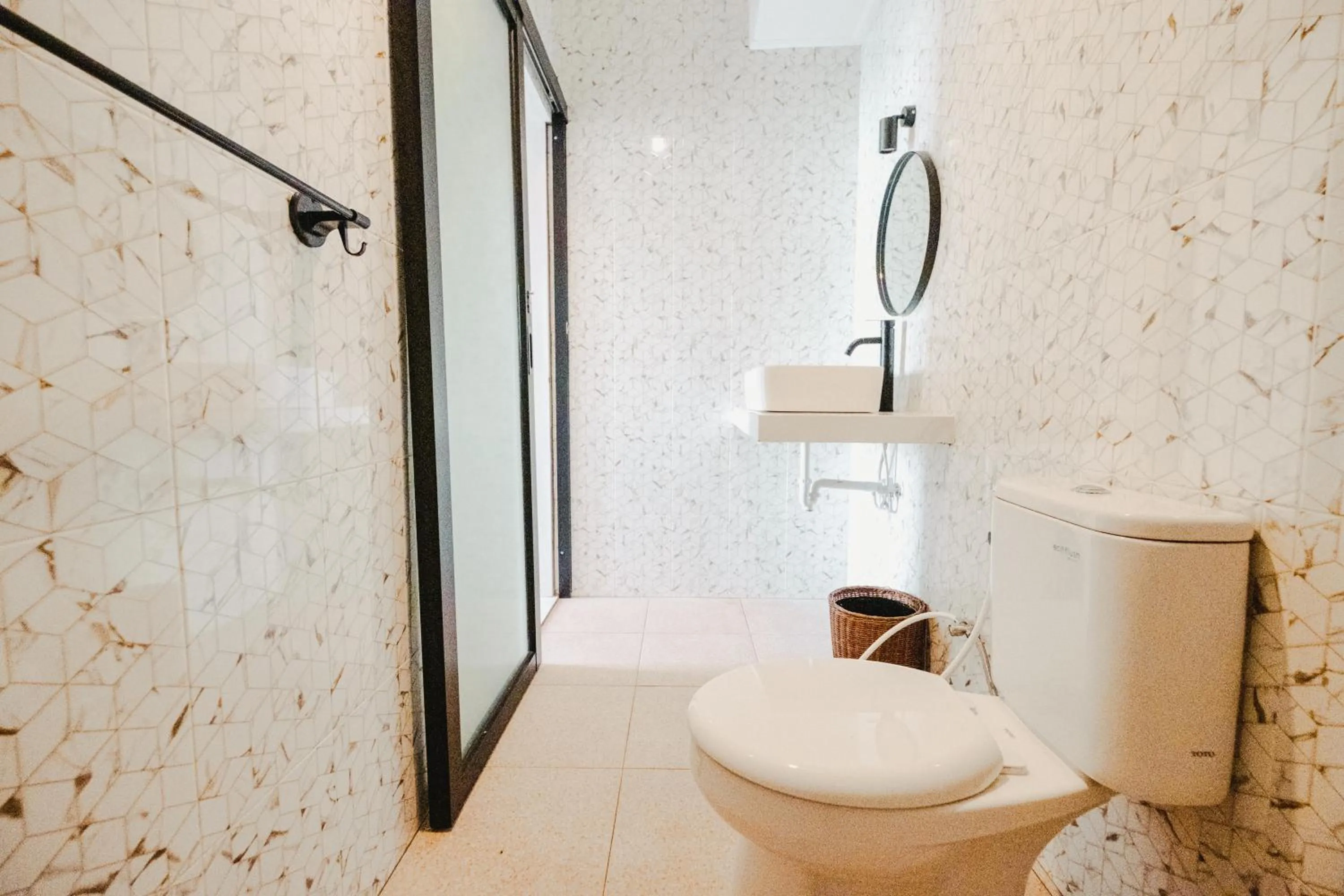 Toilet in Turtle Shelter Guest House