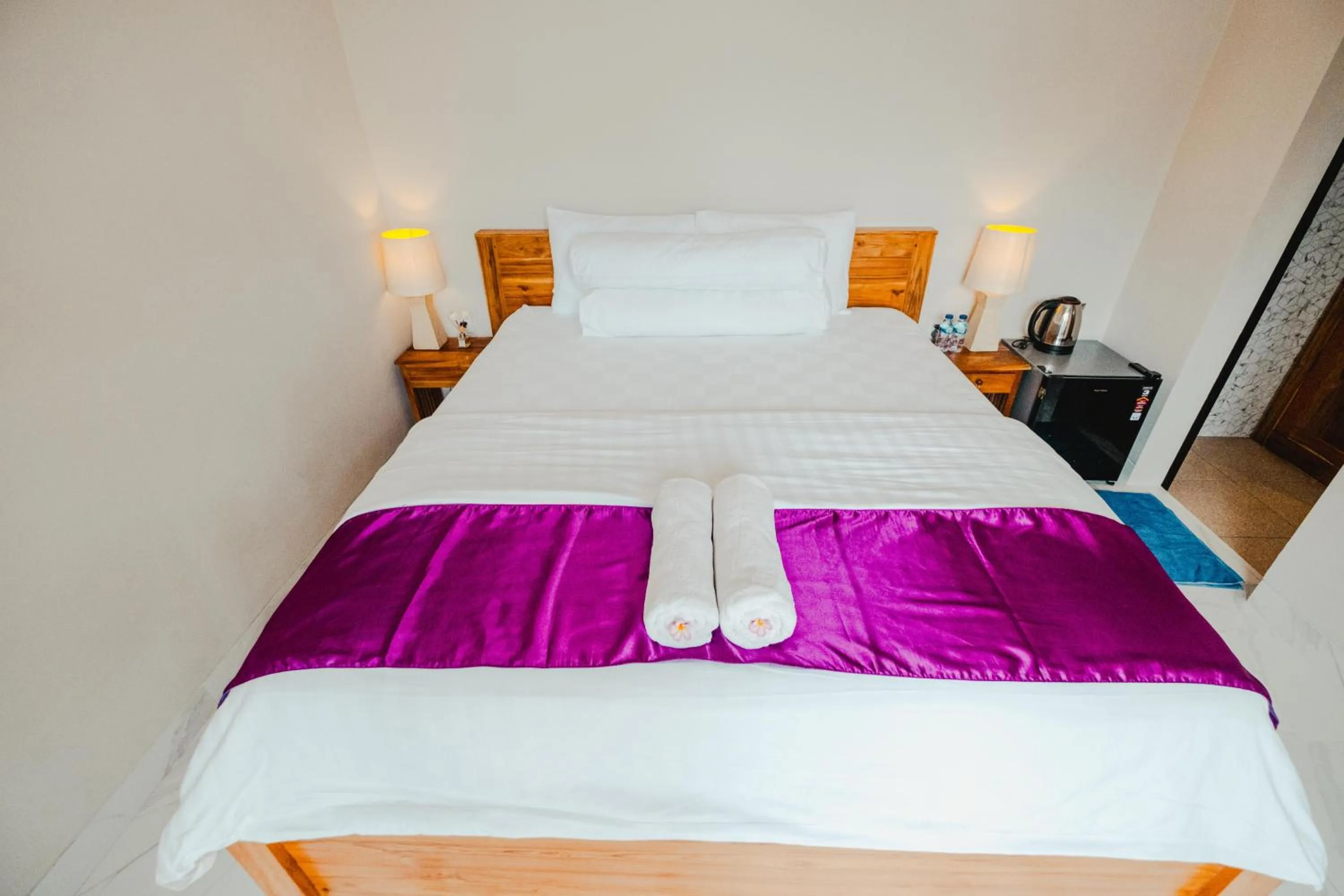 Bed in Turtle Shelter Guest House