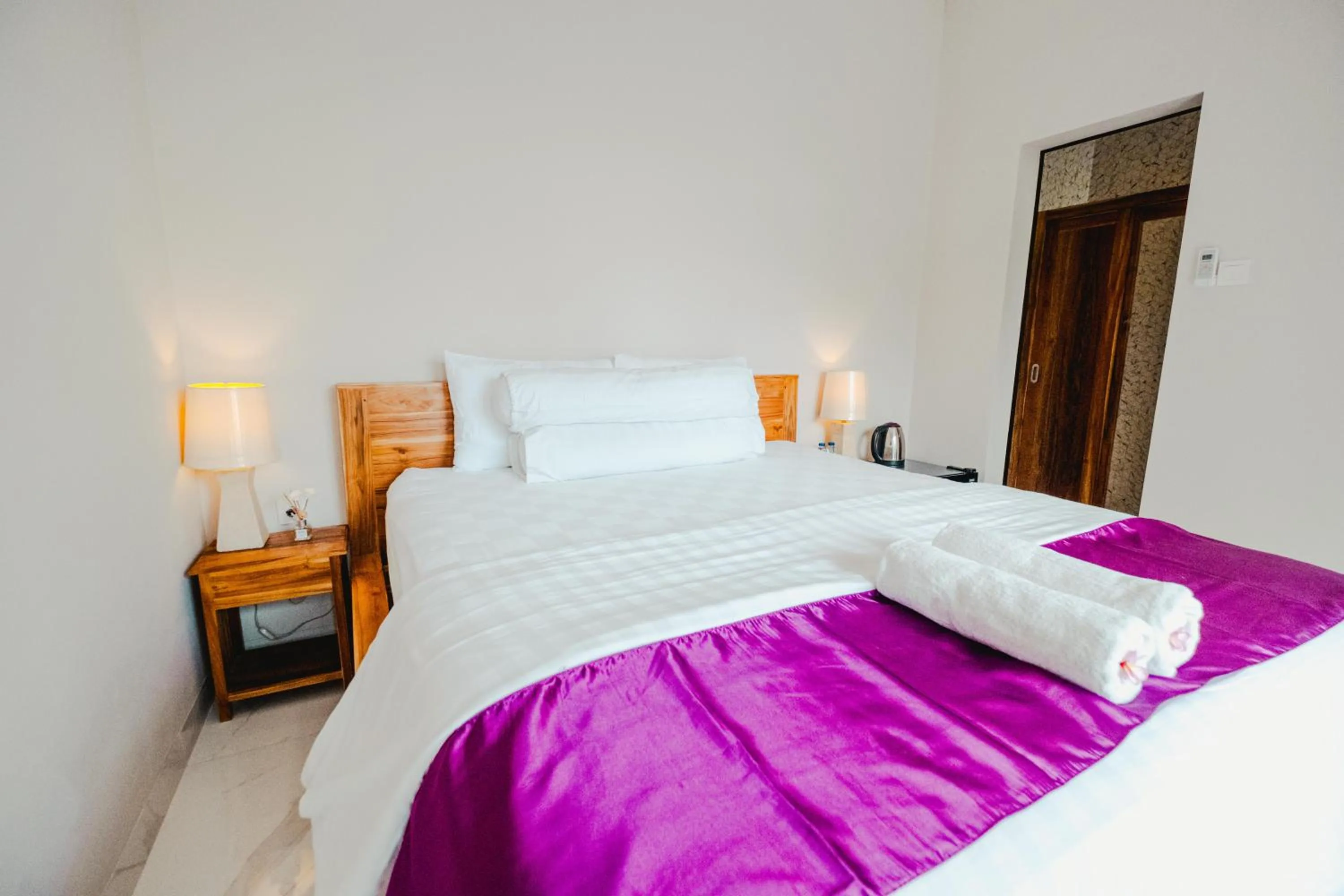 Bed in Turtle Shelter Guest House