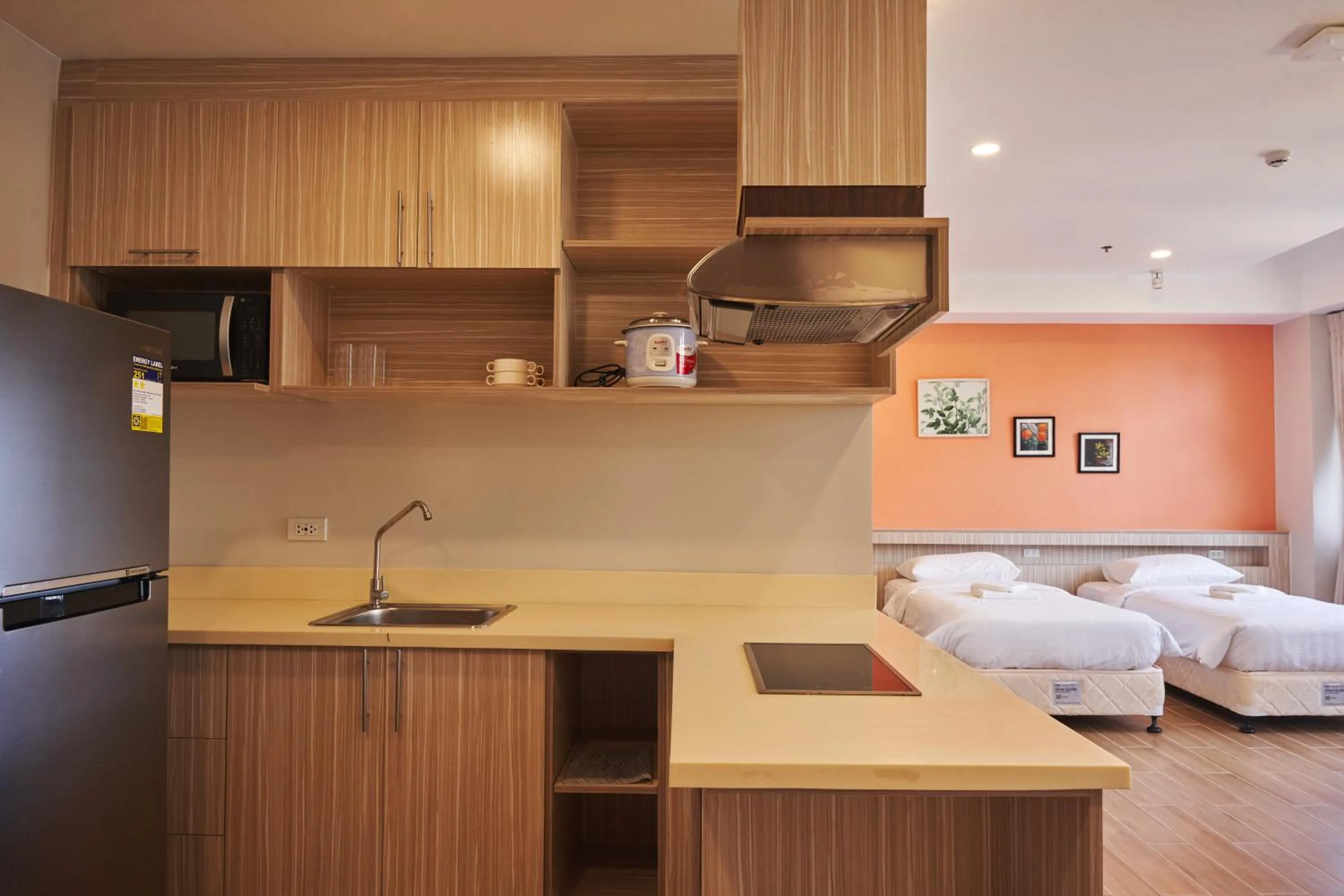 Kitchen or kitchenette, Bed in Treewoods Residences