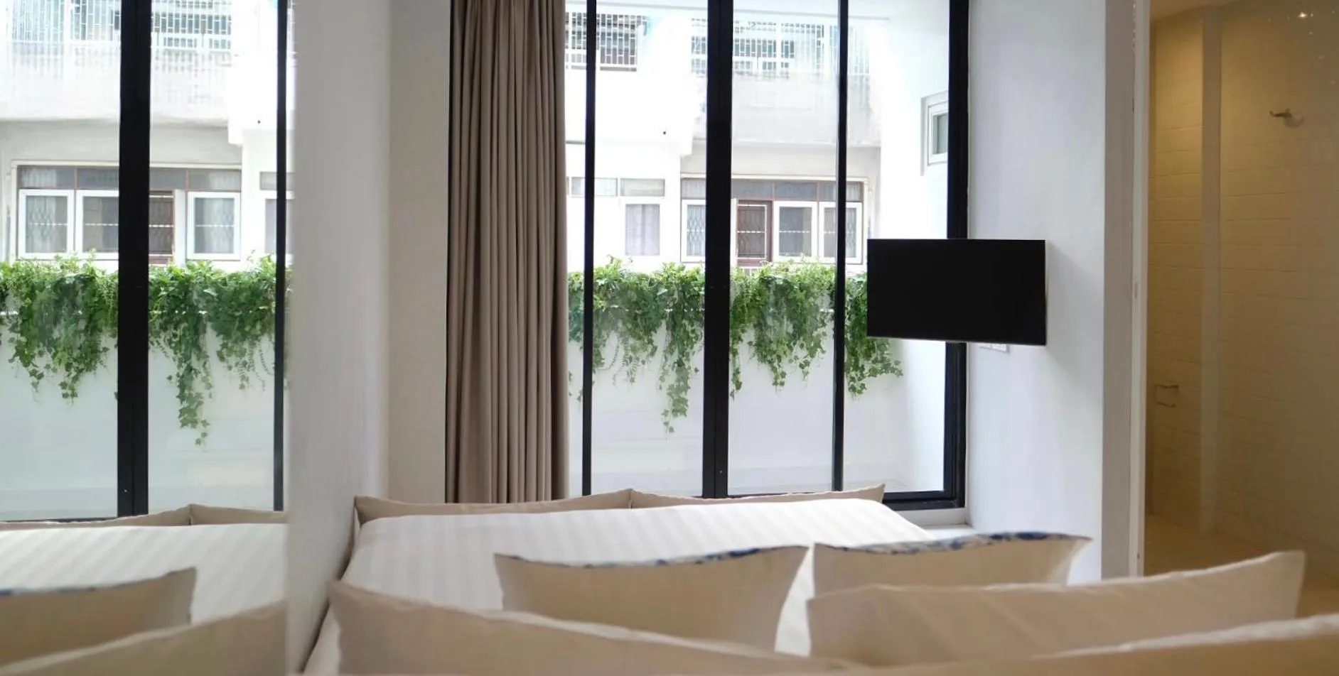 Bed in K Maison Boutique Hotel