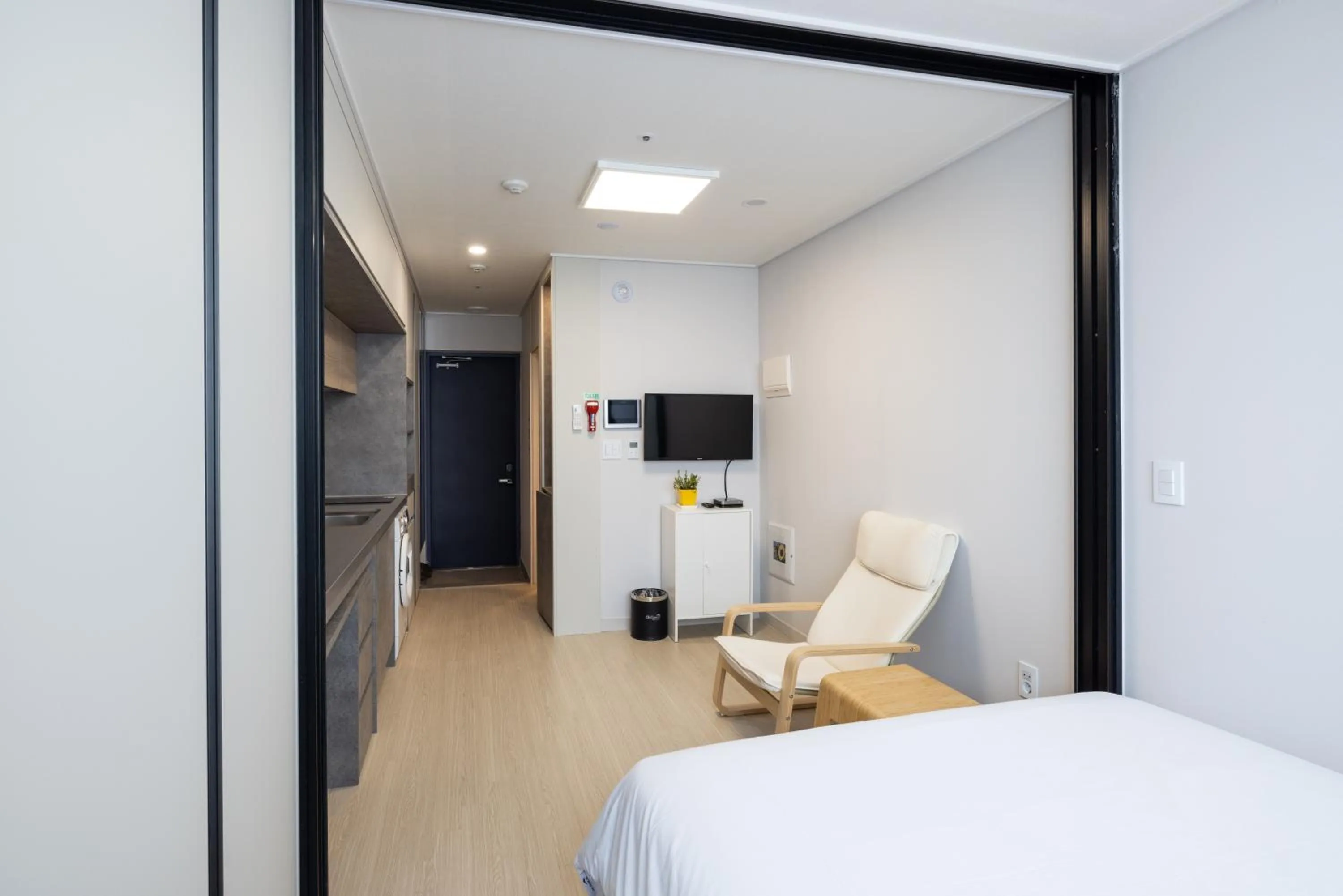 Bed in Grand Bleu Hotel & Residence