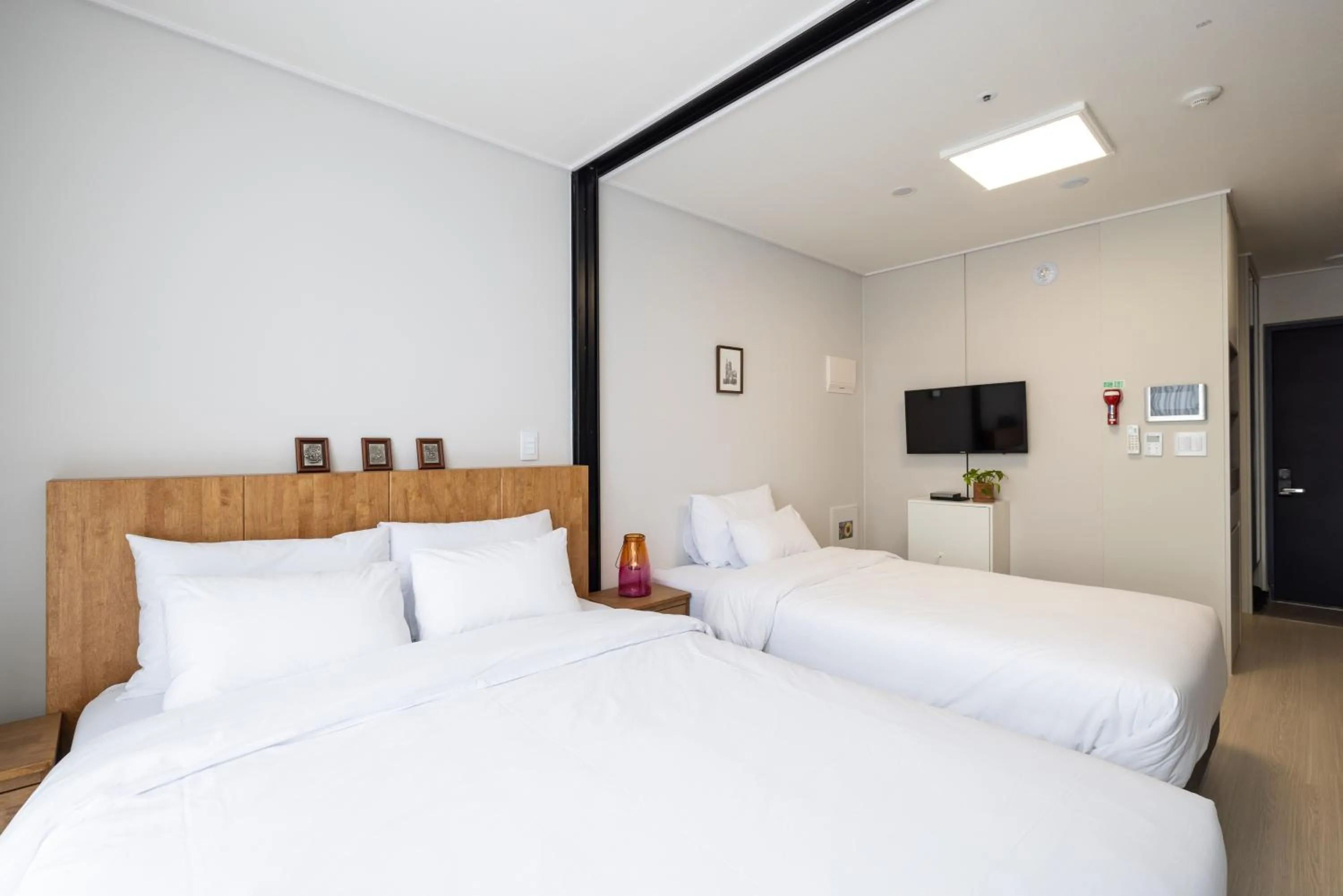 Bed in Grand Bleu Hotel & Residence