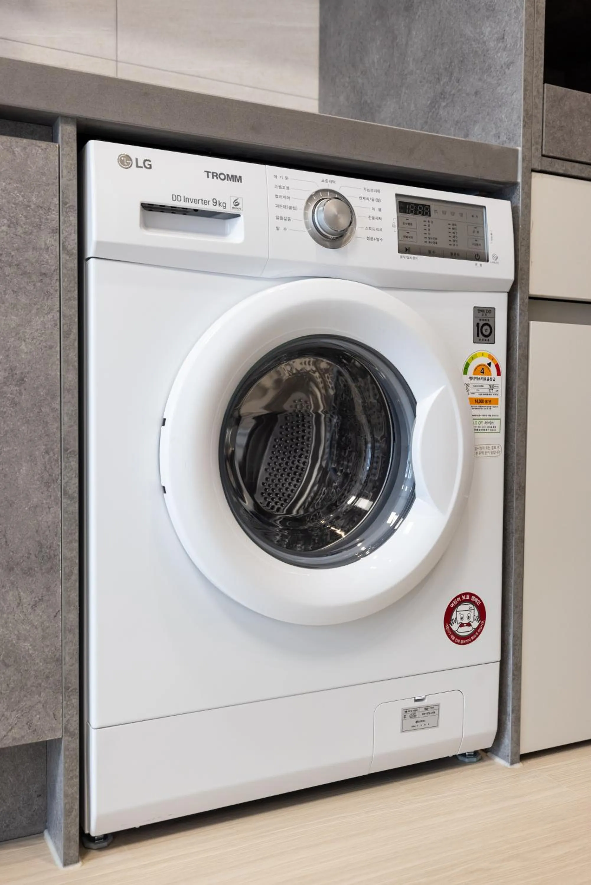 washing machine in Grand Bleu Hotel & Residence