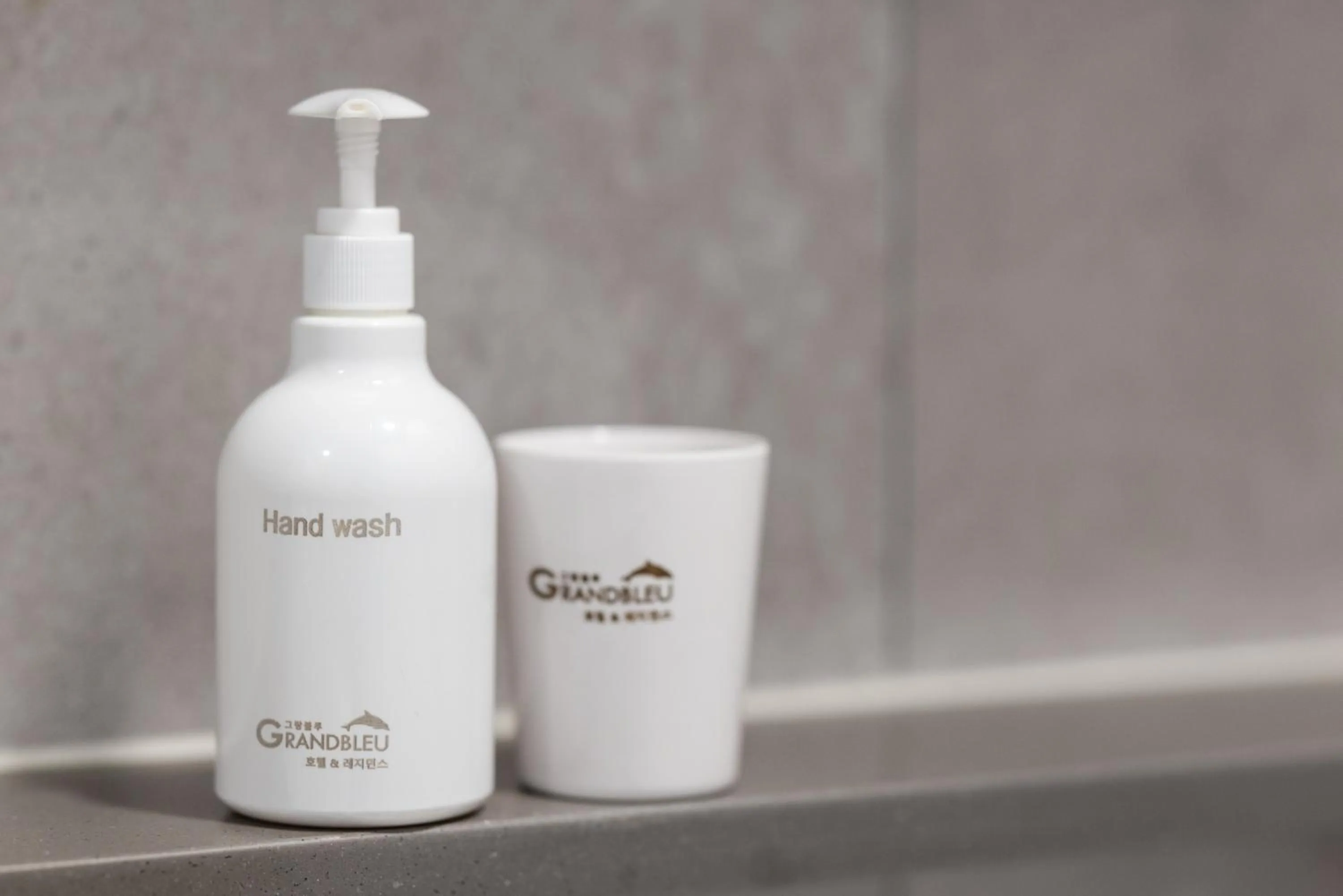 Toilet in Grand Bleu Hotel & Residence