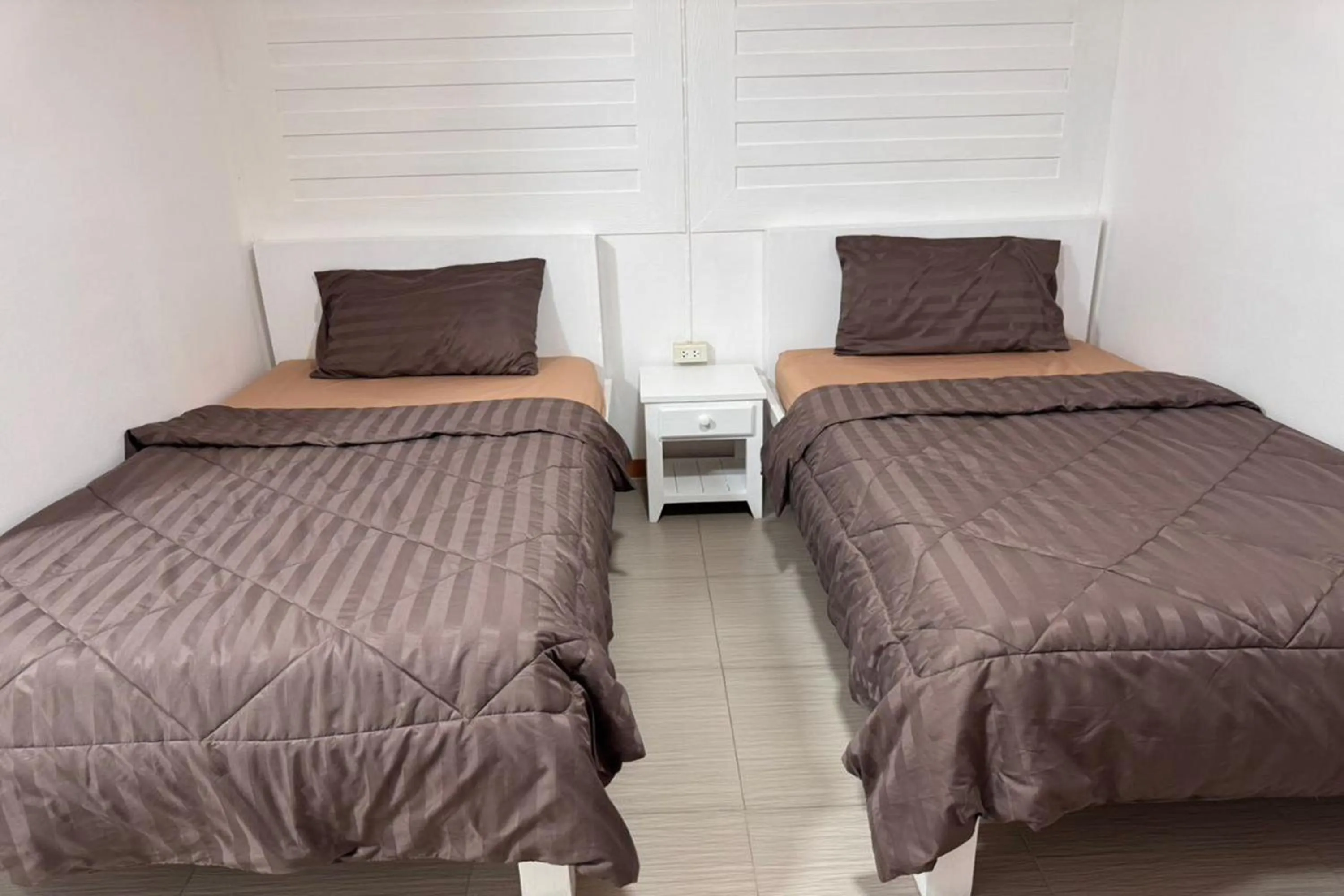 Bed in Ban Suan Suree Resort