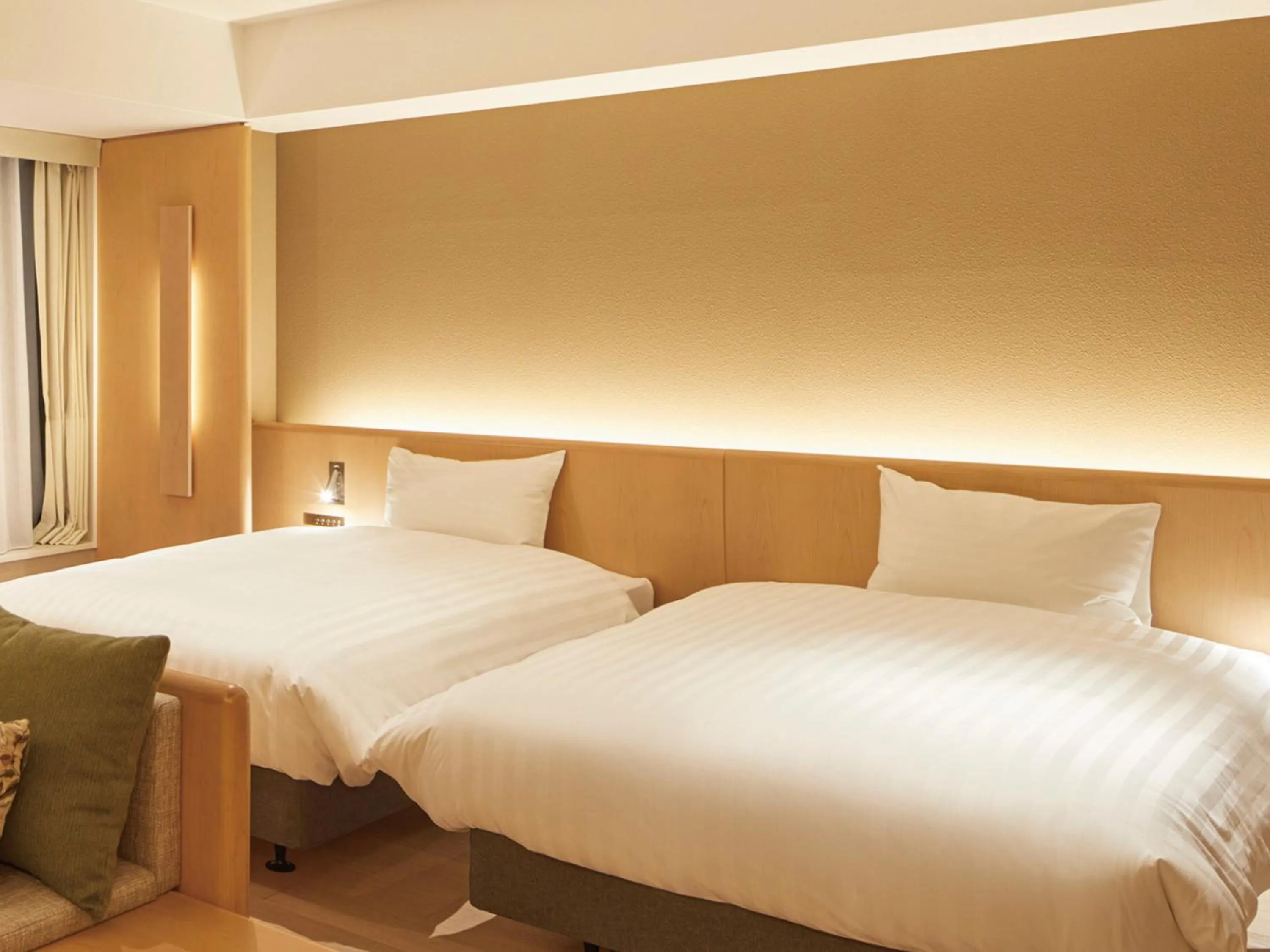 Bed in Dorsett by Agora Osaka Sakai