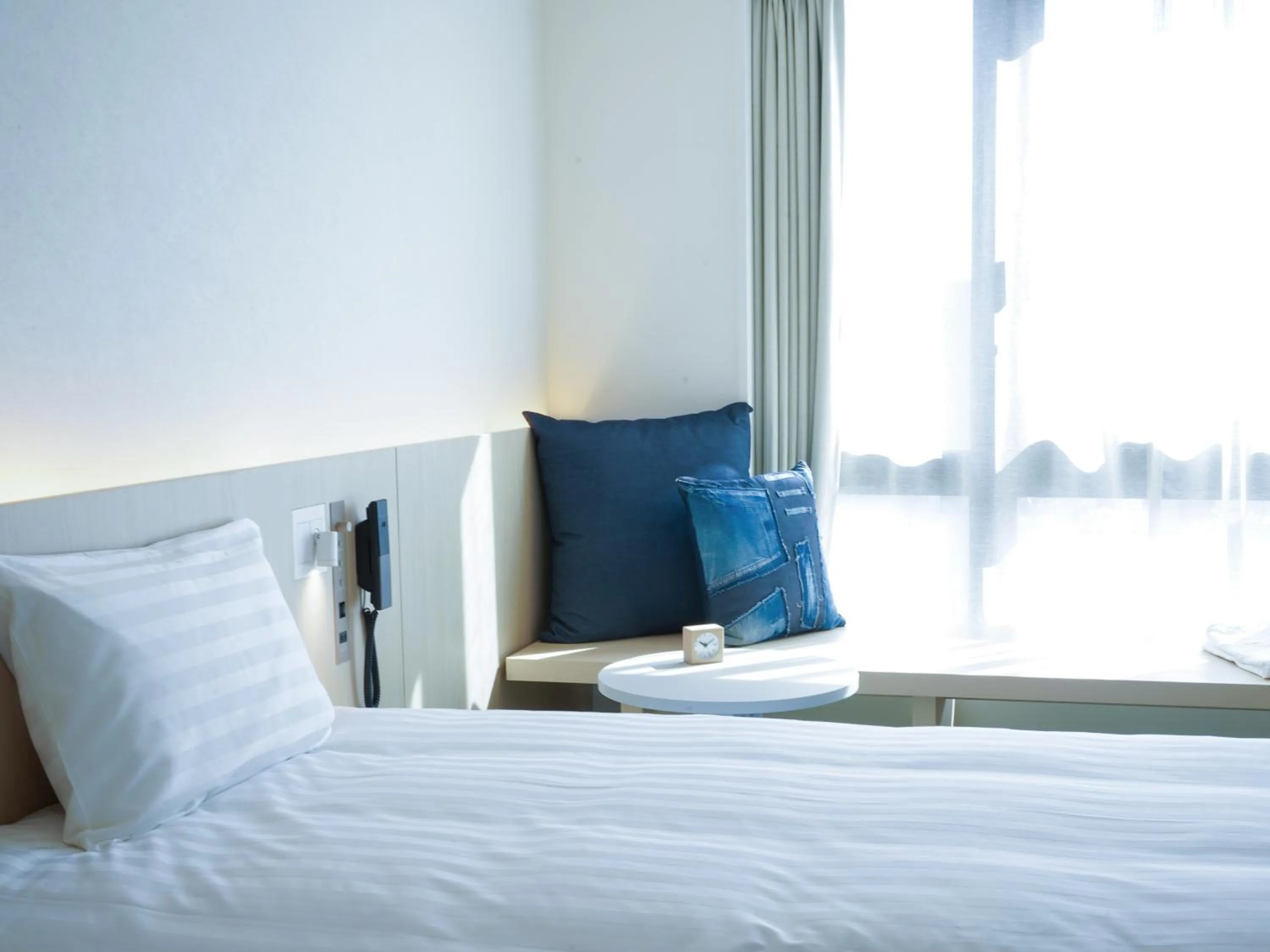 Bed in Dorsett by Agora Osaka Sakai