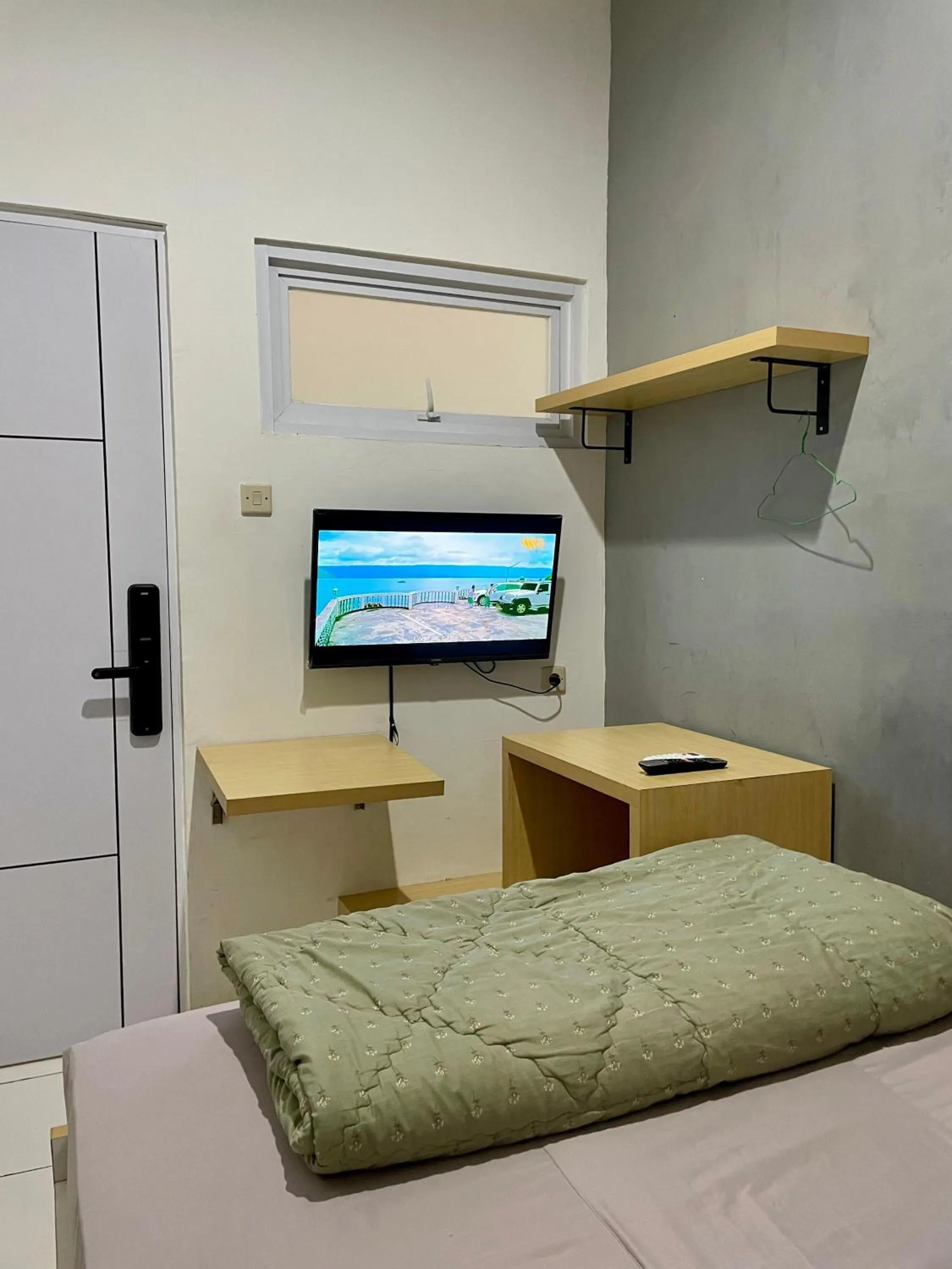 Bed in Behomy Cibinong Suite