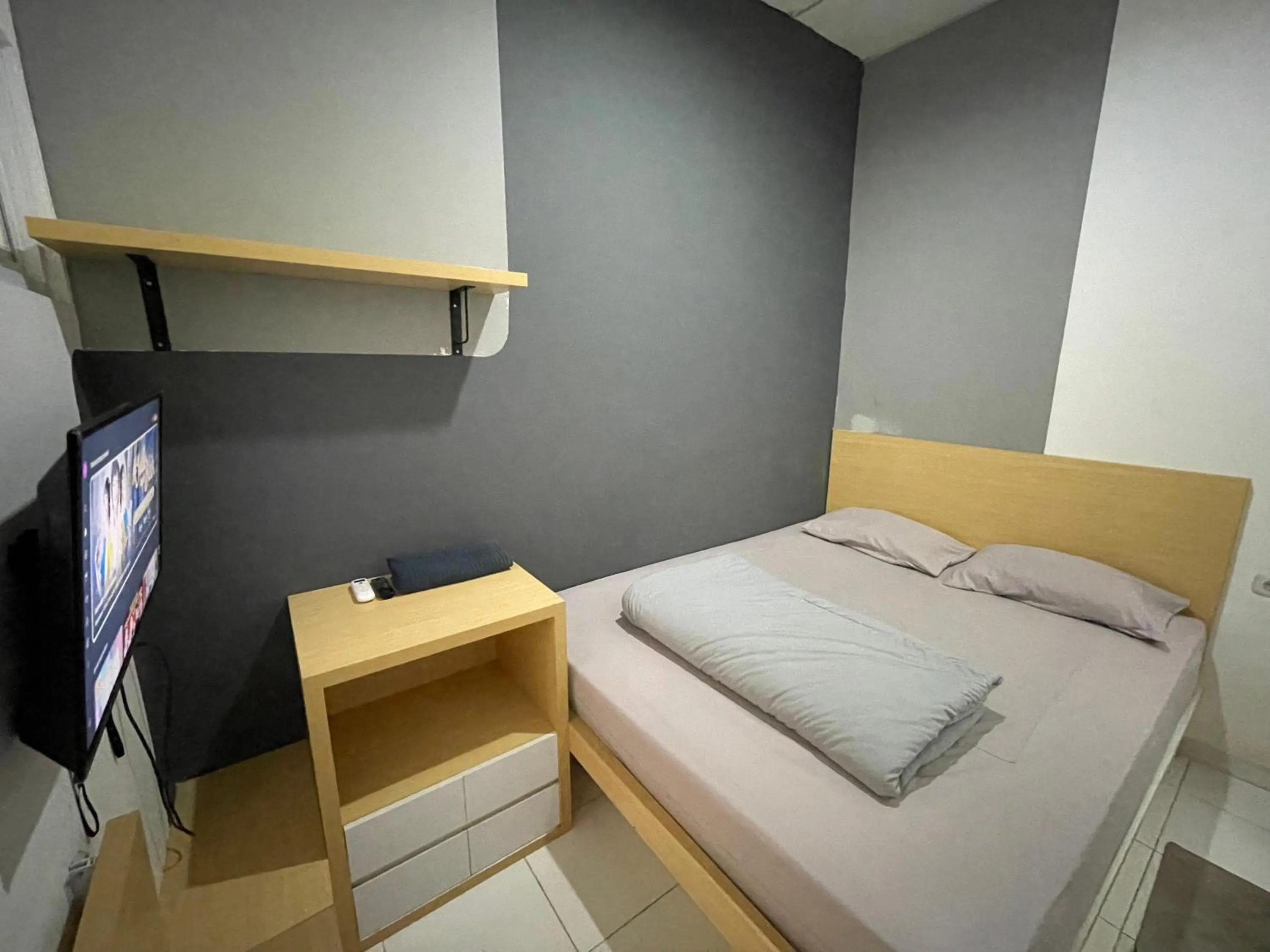 Bed in Behomy Cibinong Suite