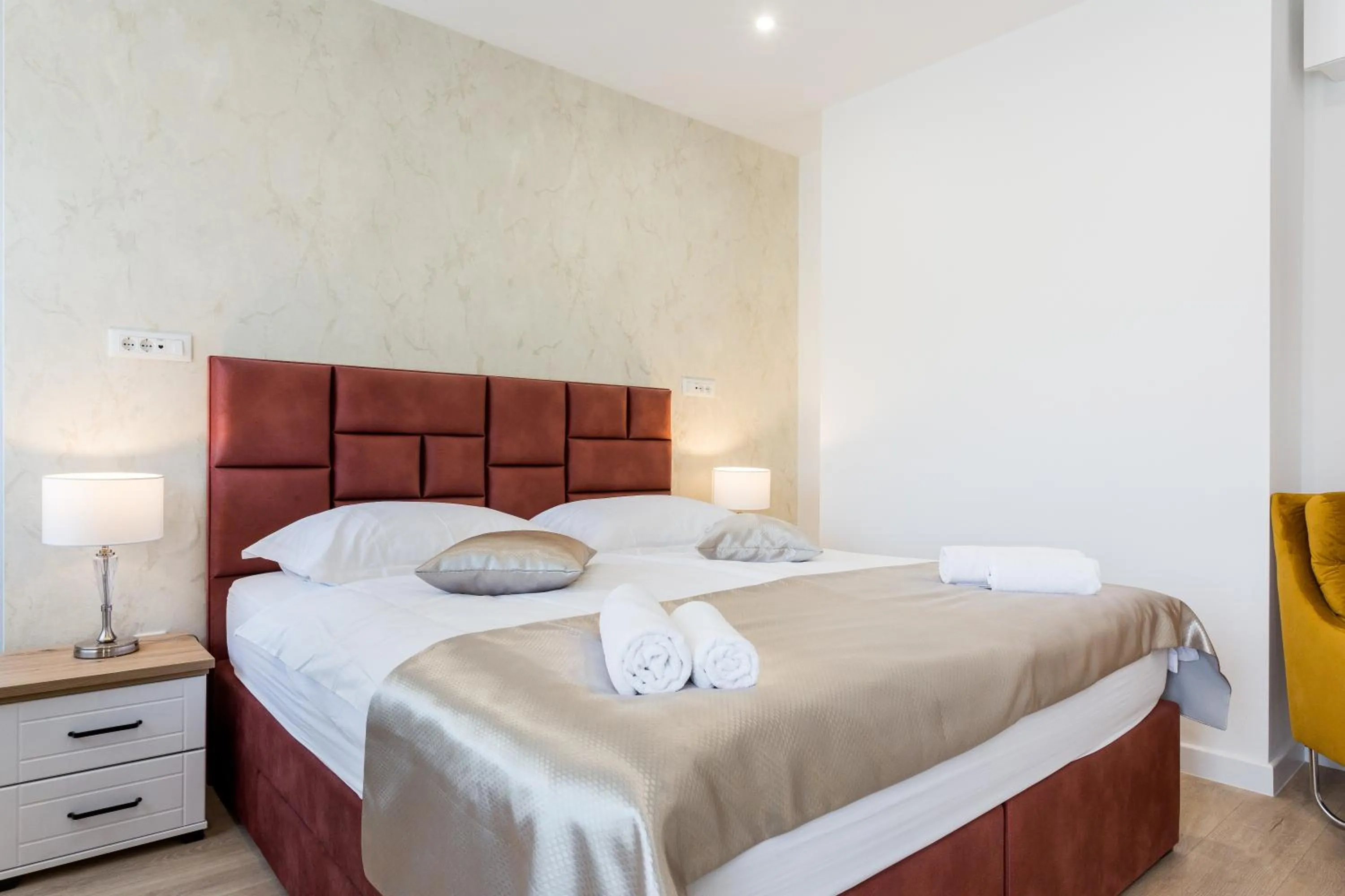 Bed in Shine of Life Luxury Rooms