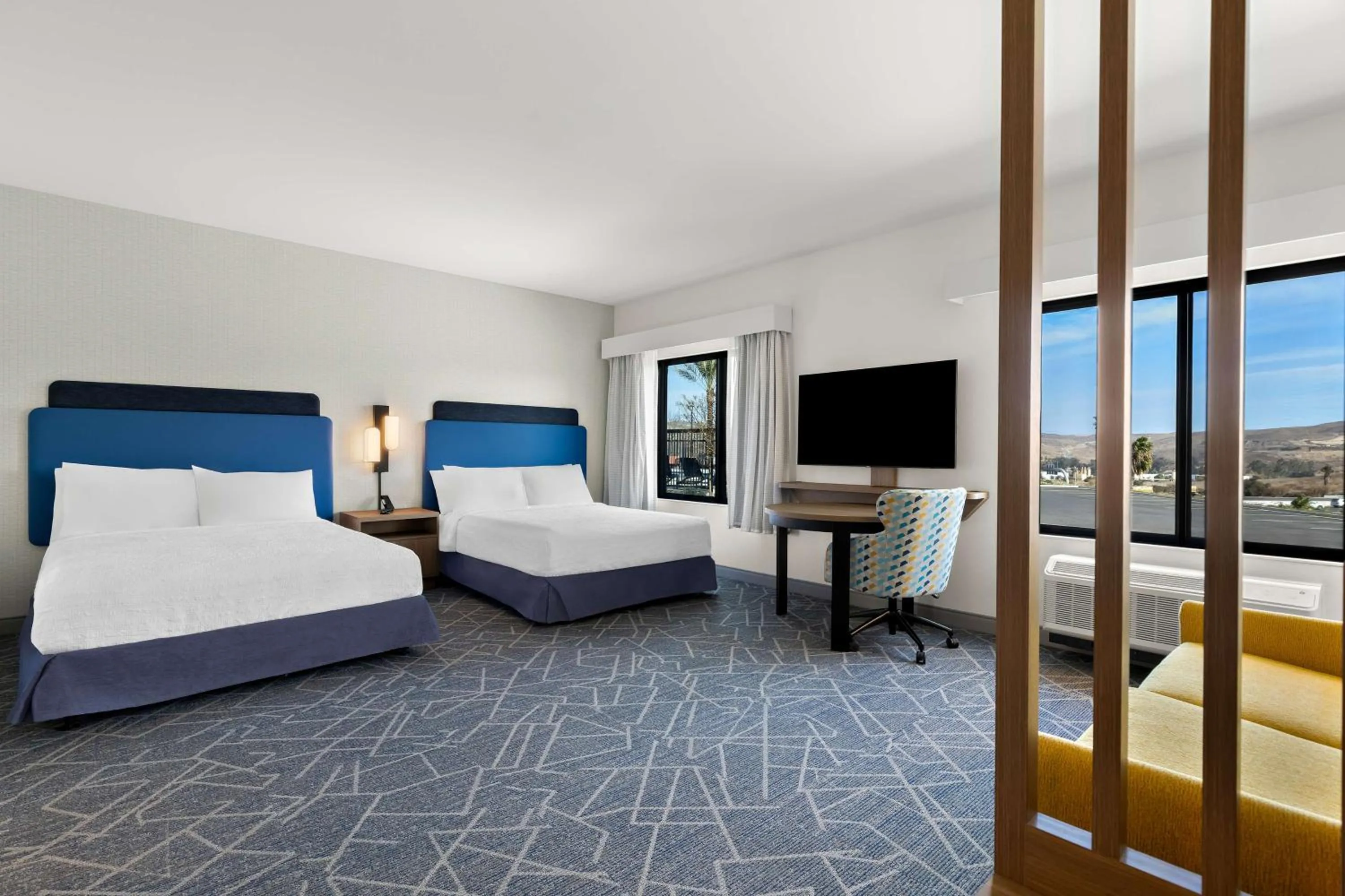 Bed in Hampton Inn & Suites Corona, Ca