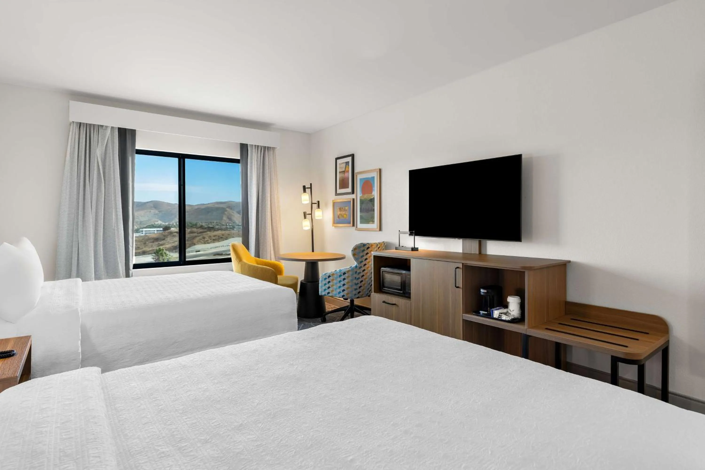 Bed in Hampton Inn & Suites Corona, Ca