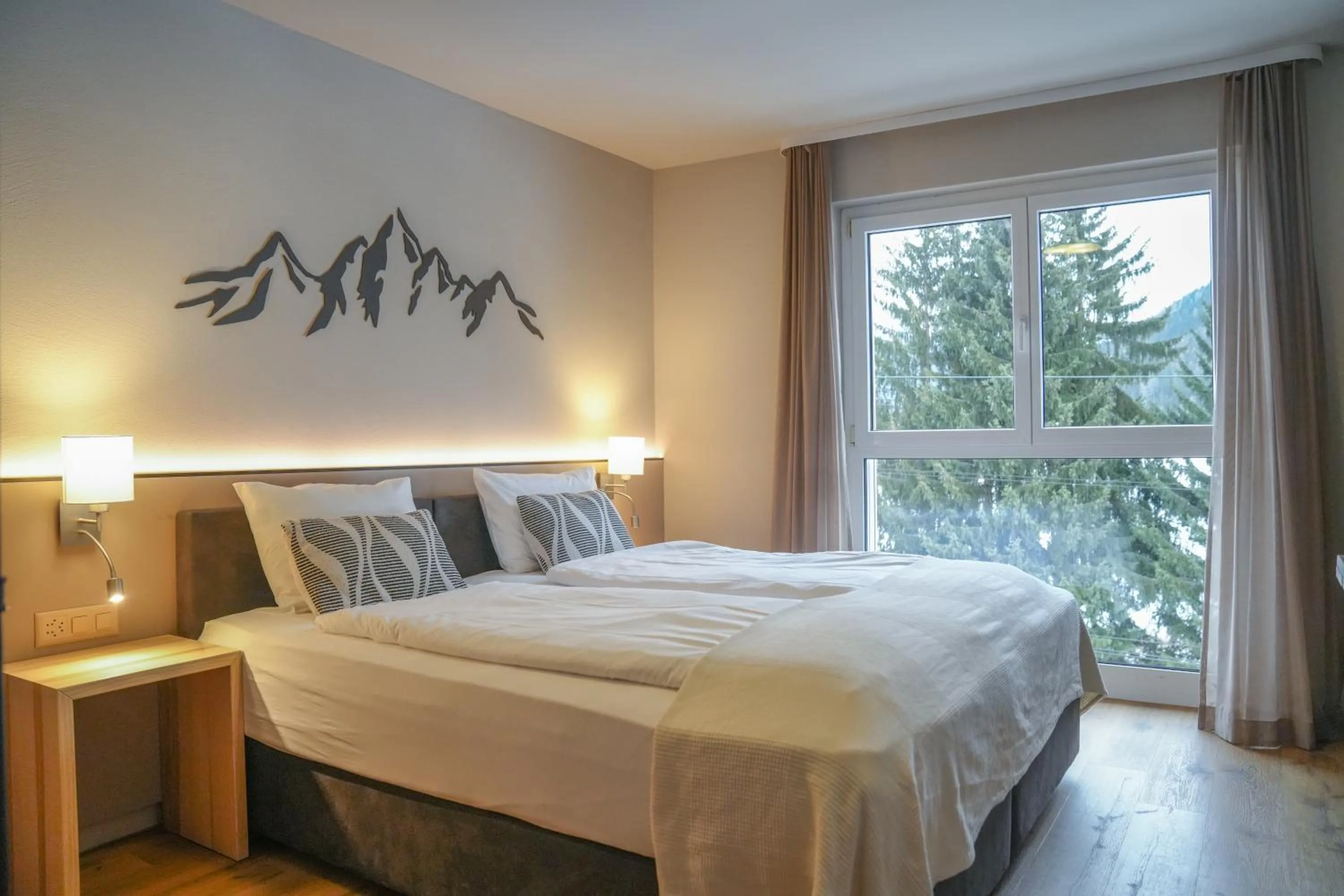 Photo of the whole room, Bed in Studio 54 Davos