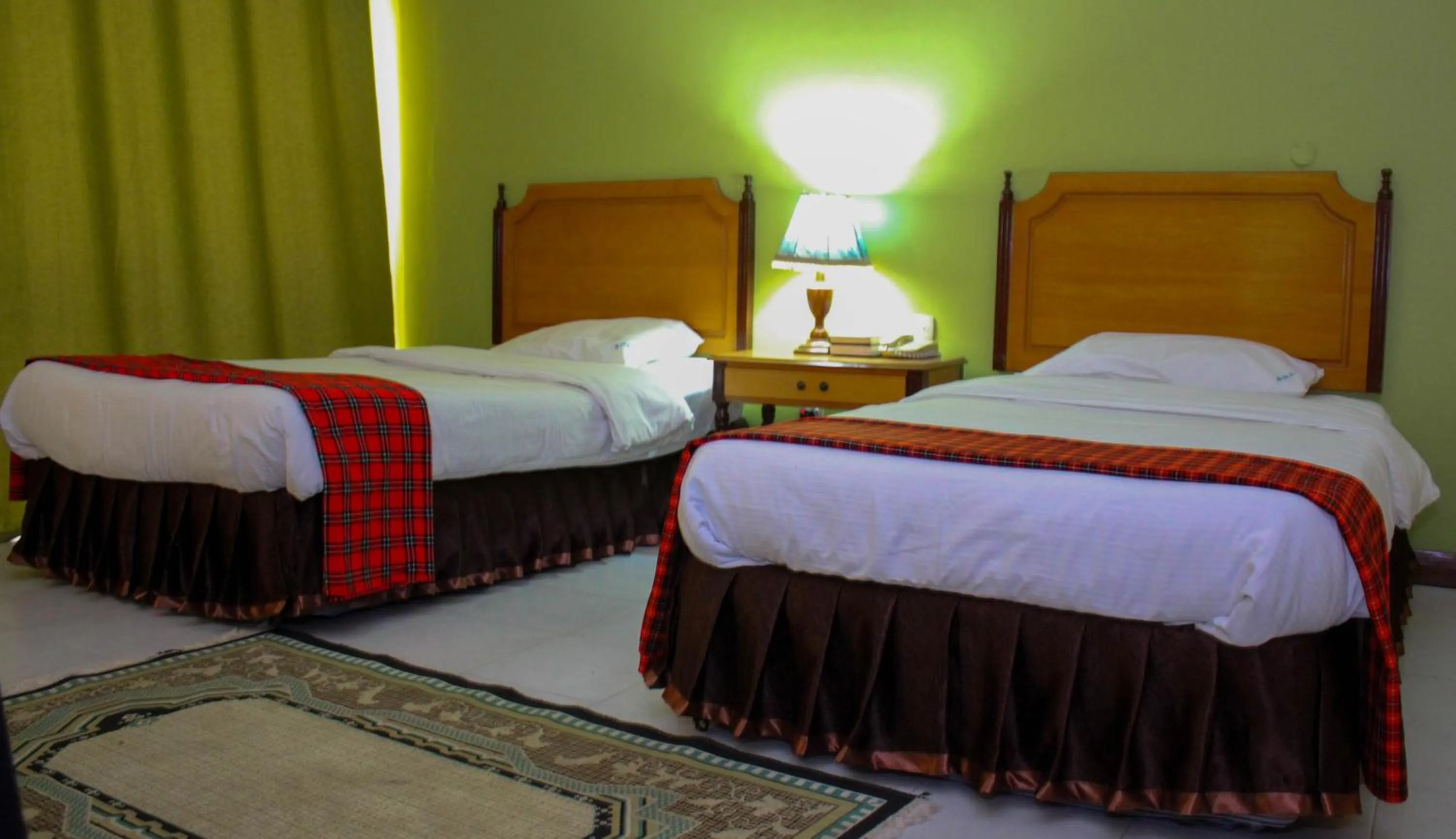 Bed in Equator Hotel