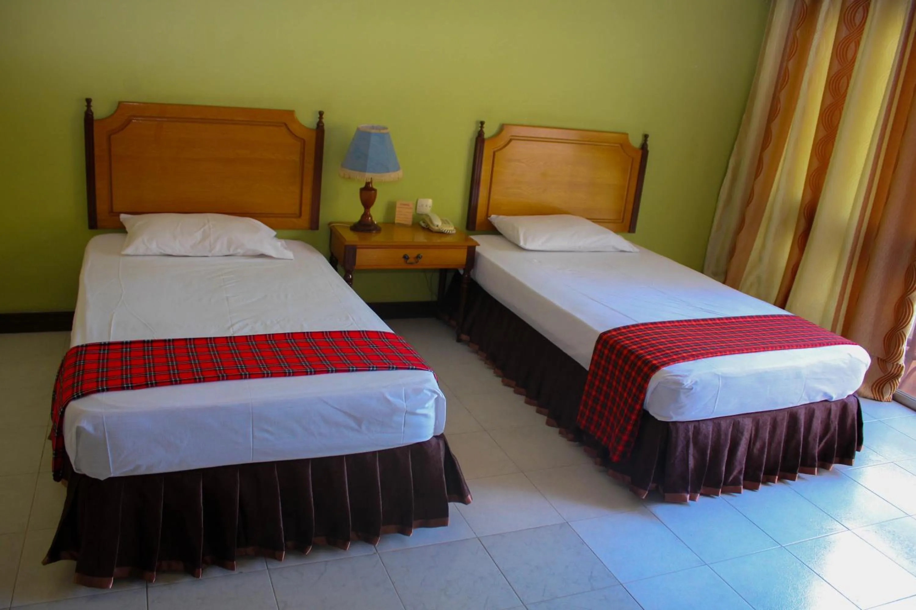 Bed in Equator Hotel