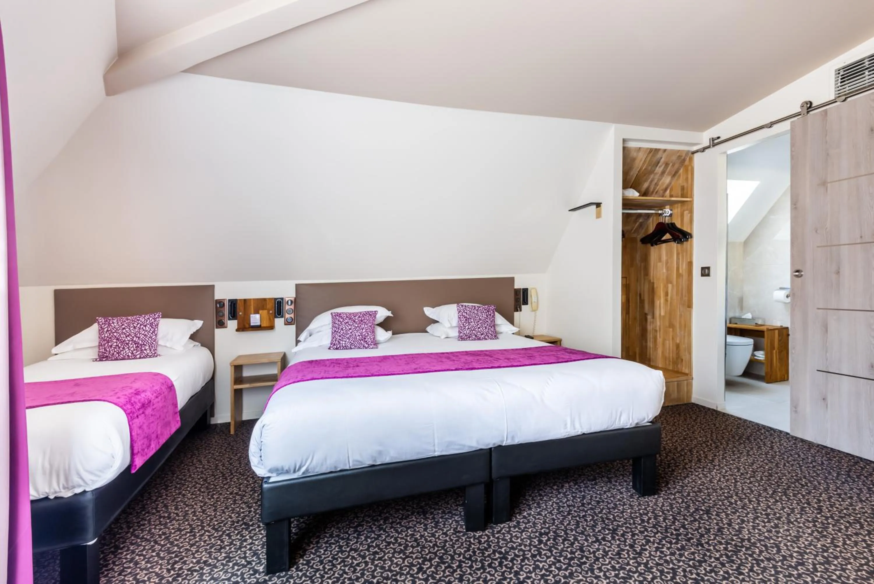 Bed in hotel Louvre Sainte Anne