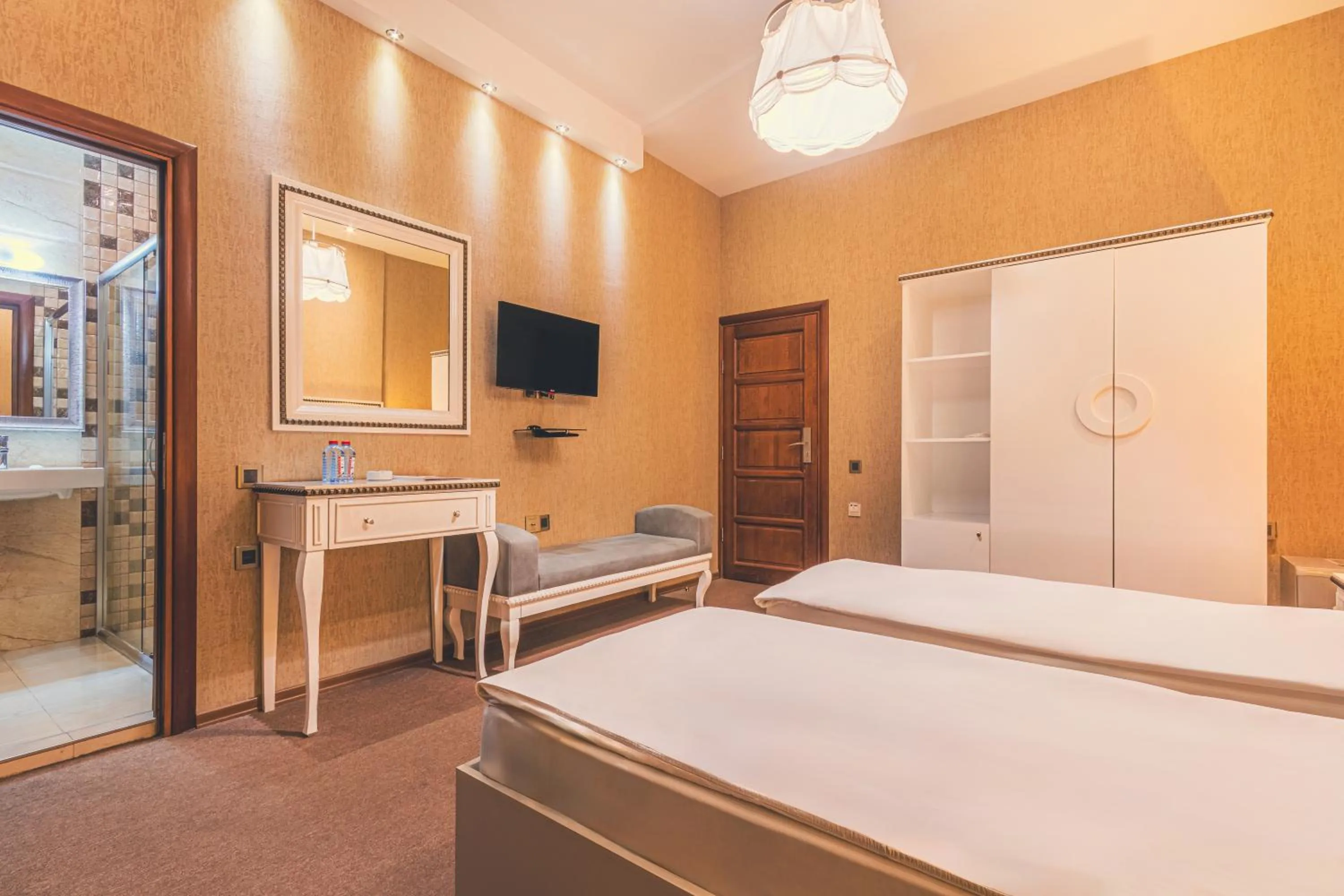 Bed in Maestro Hotel