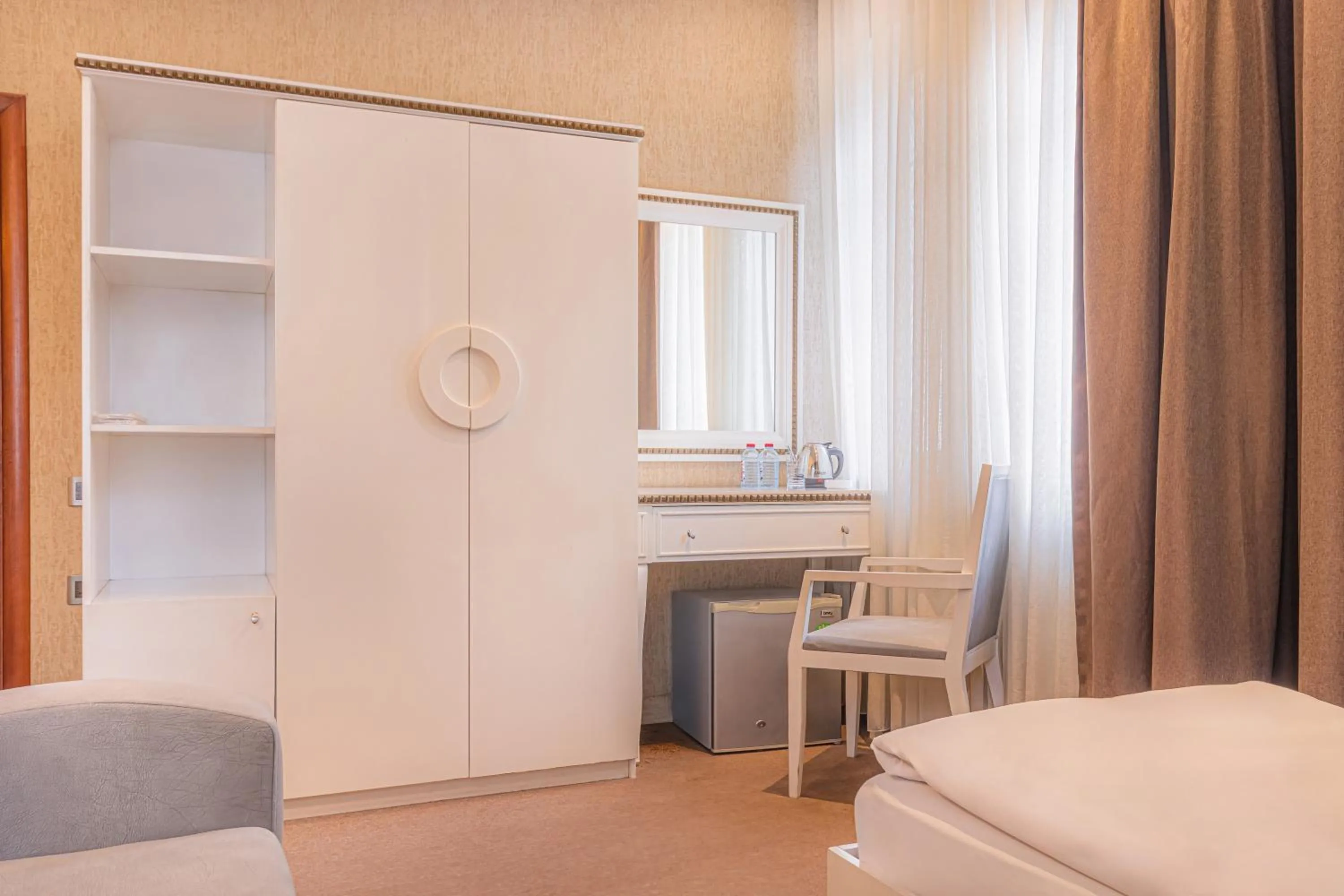 Bed in Maestro Hotel