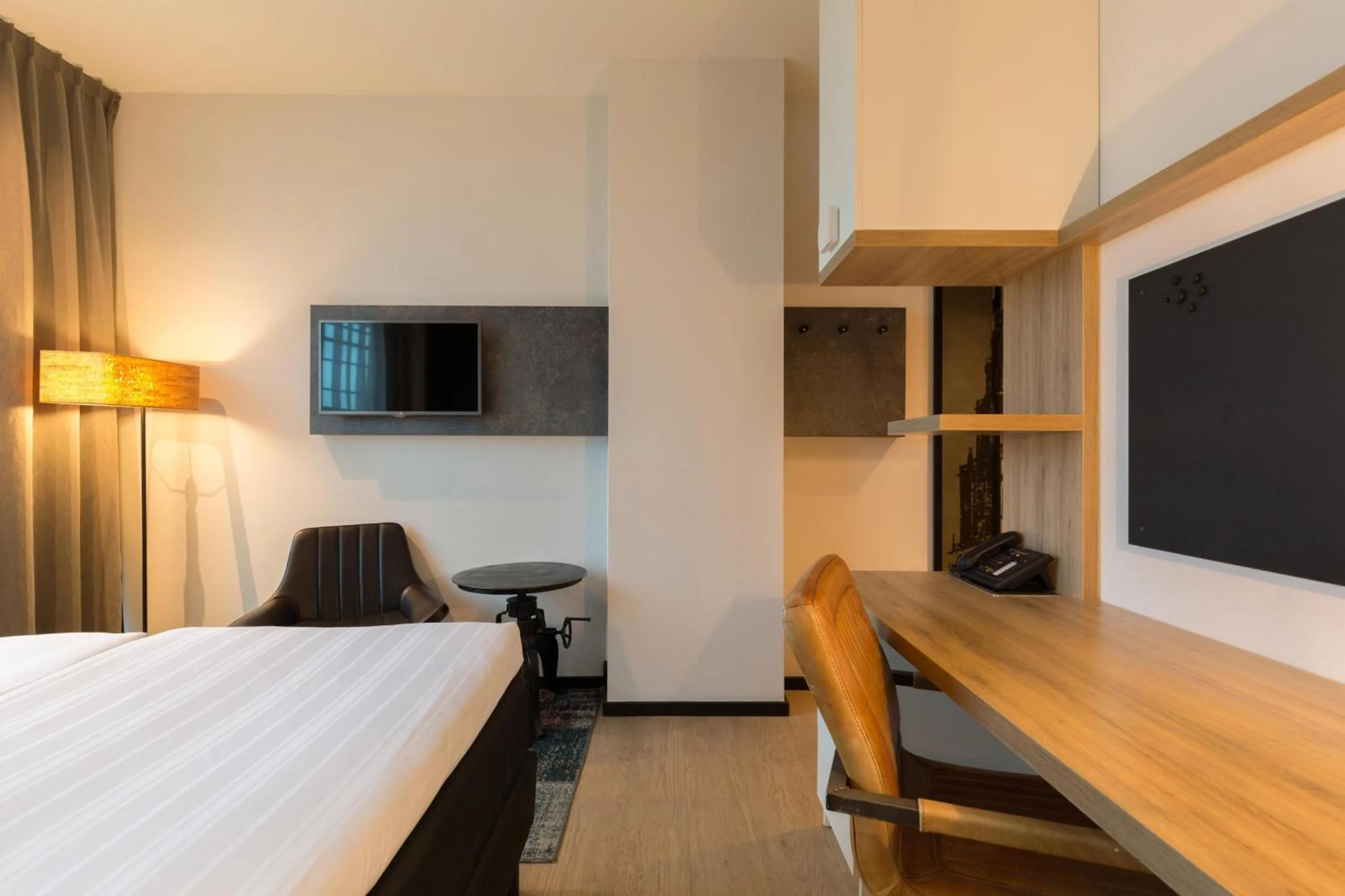 Photo of the whole room, Bed in Leonardo Hotel Groningen Stadspark