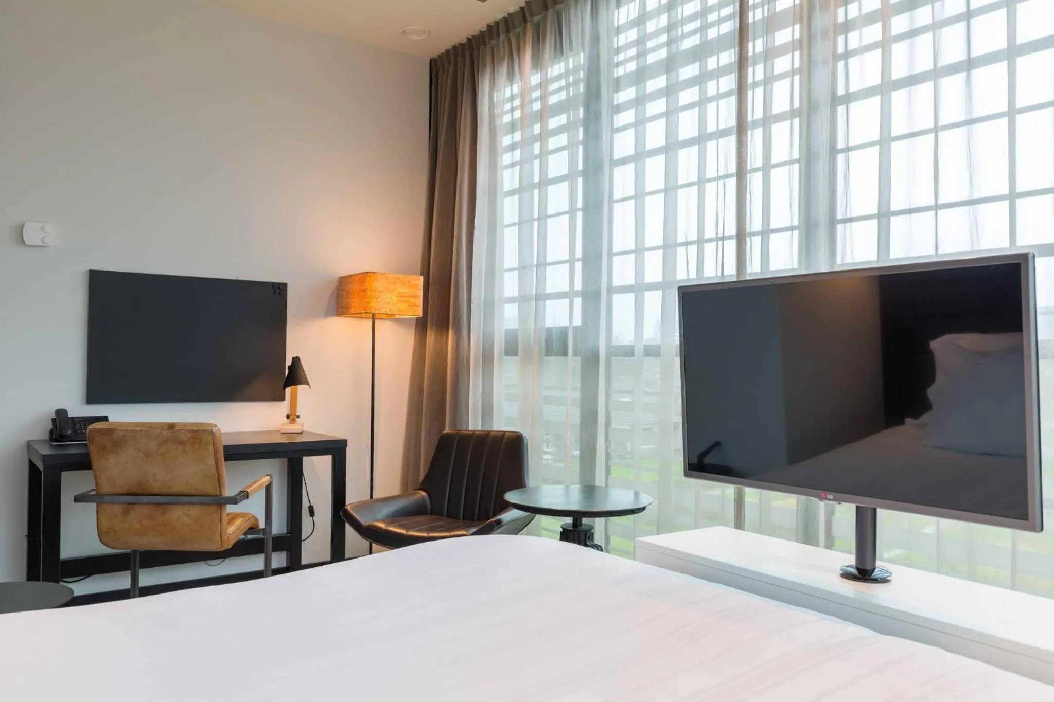 Photo of the whole room, Bed in Leonardo Hotel Groningen Stadspark