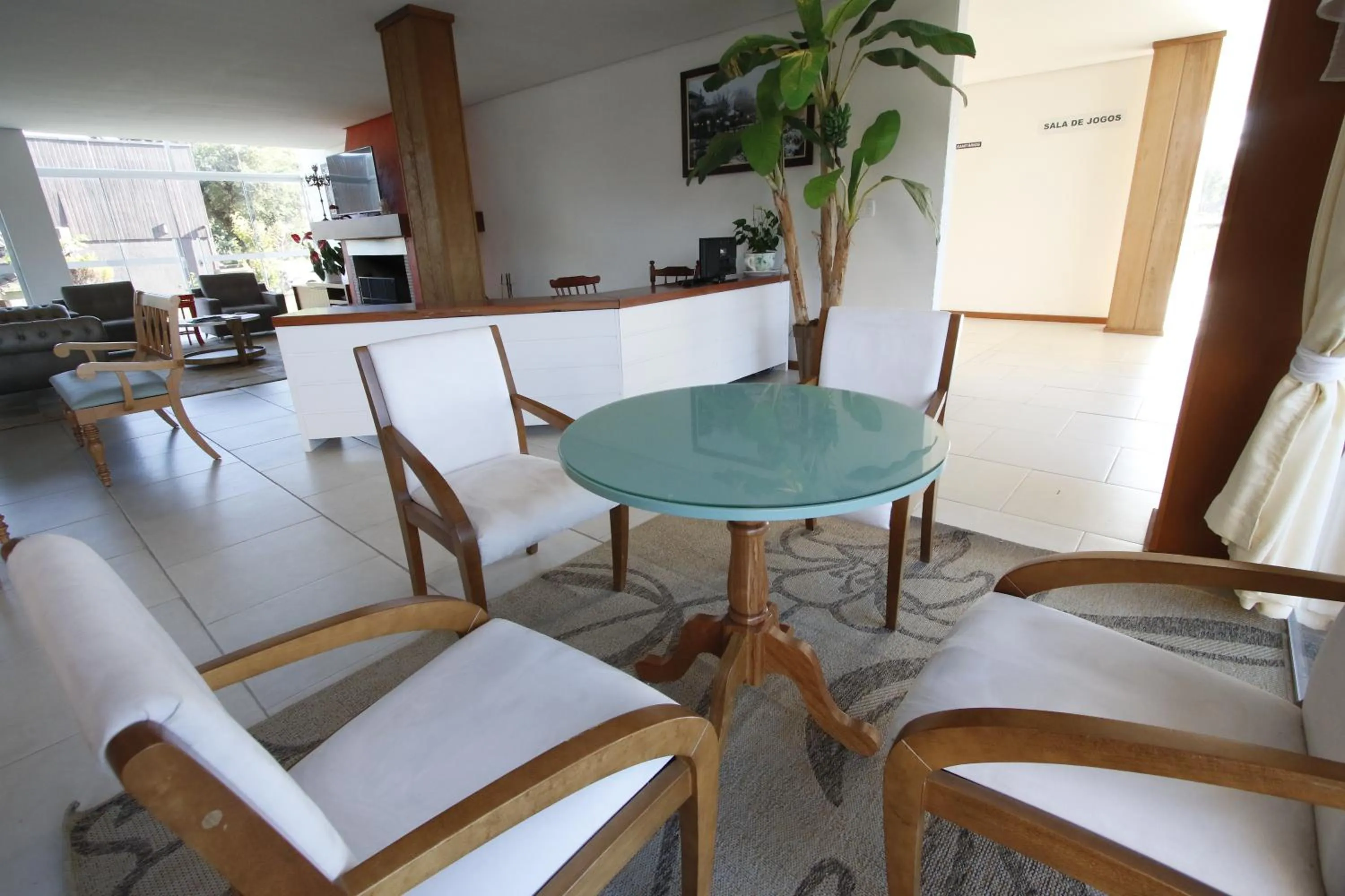 Communal lounge/ TV room in Hotel Villa Aconchego de Gramado