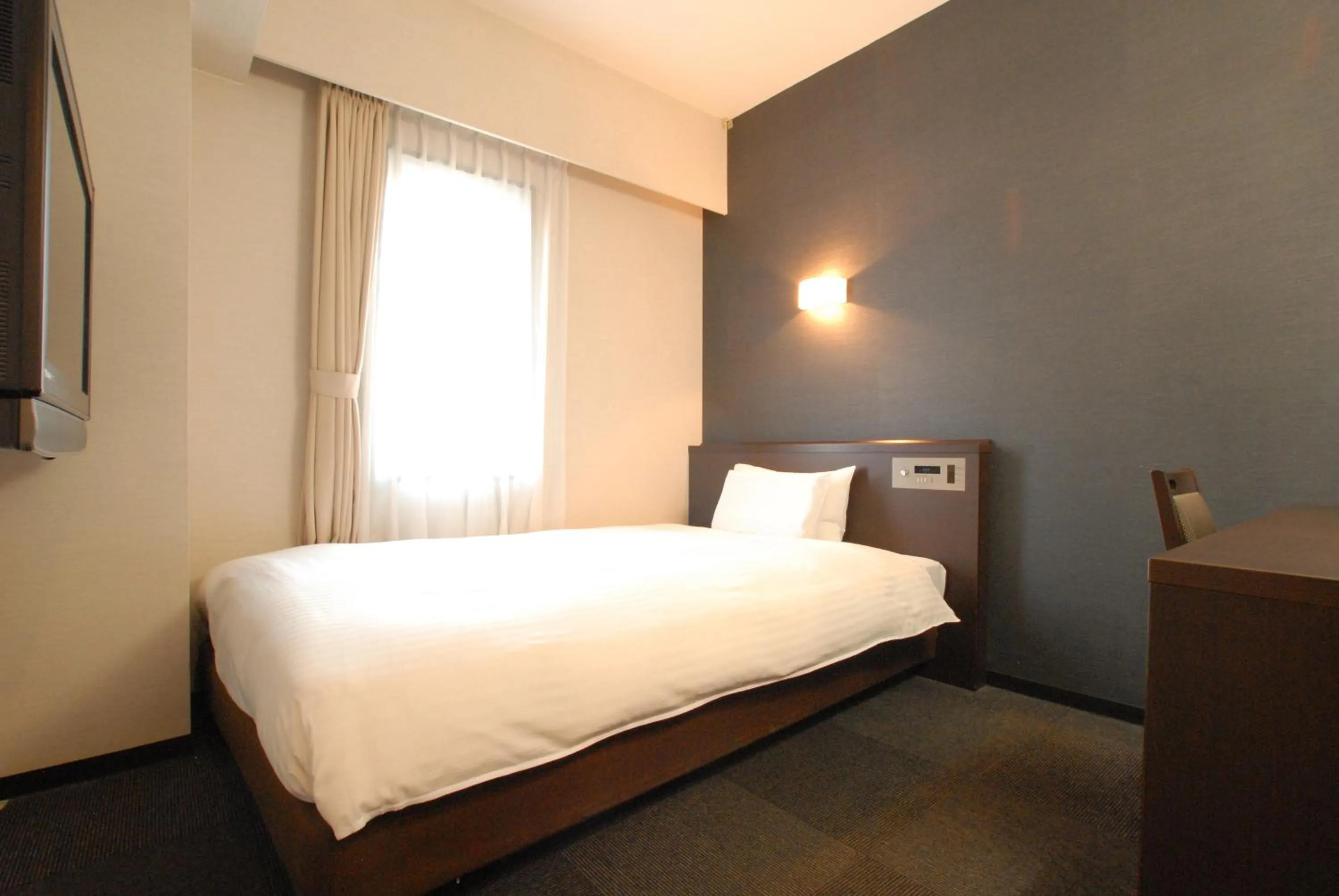 Bed in AB Hotel Mikawa Anjo Minamikan