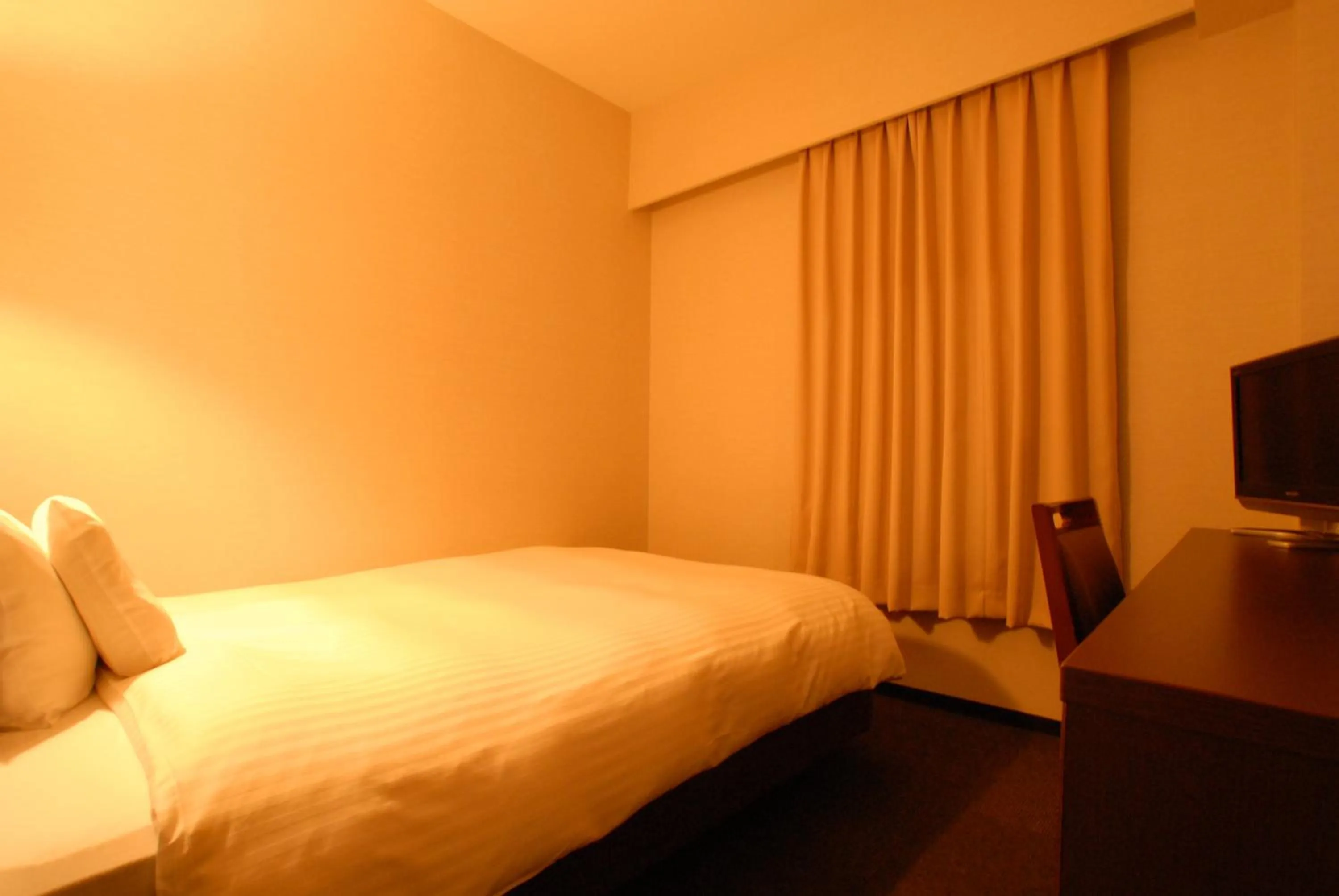 Bed in AB Hotel Mikawa Anjo Minamikan