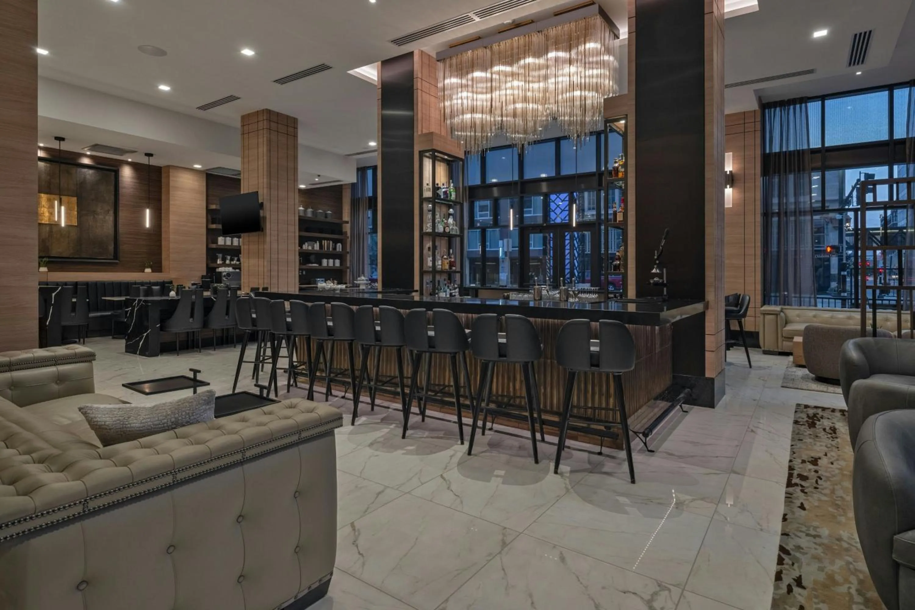 Lounge or bar in AC Hotel by Marriott Wichita Downtown
