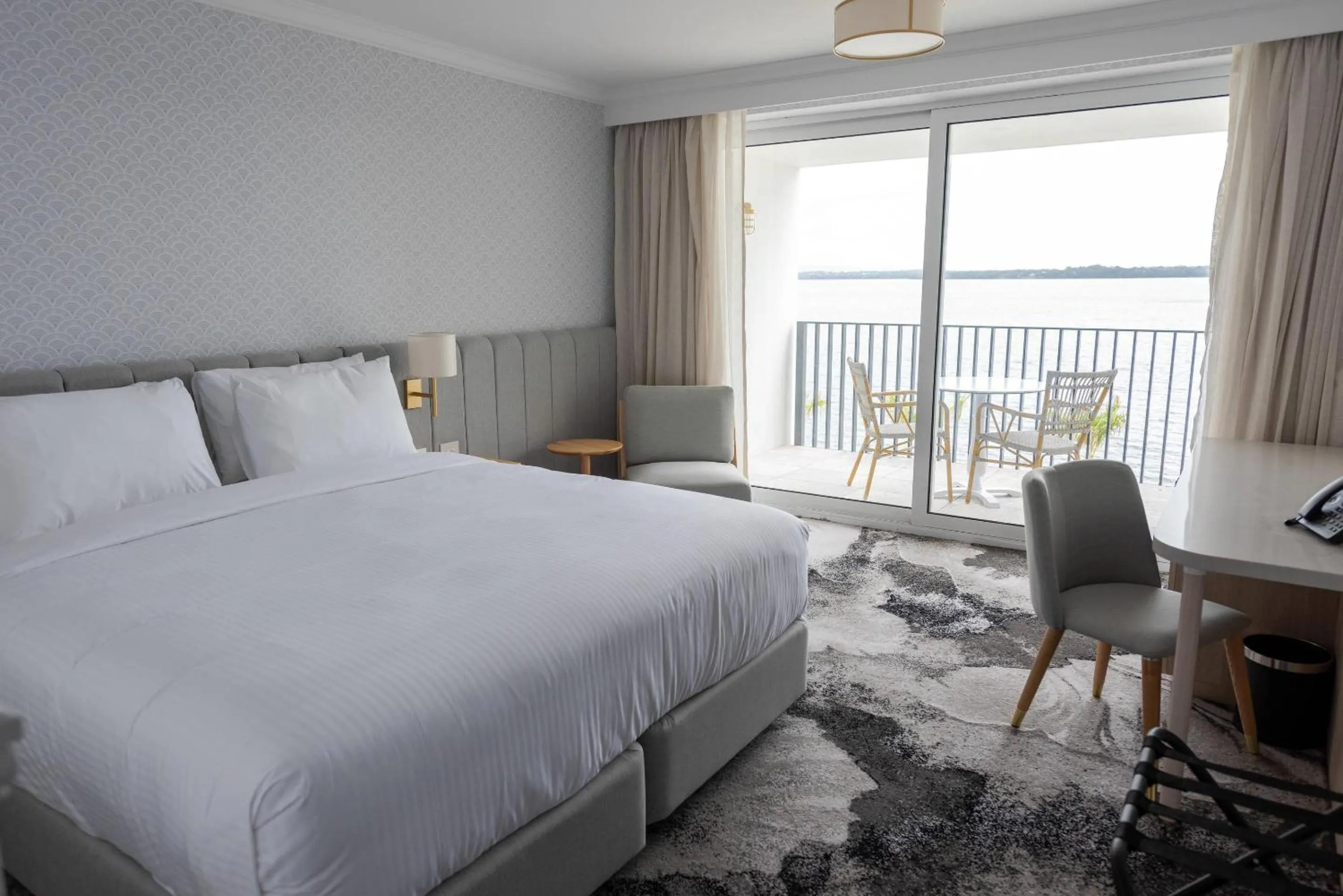 Bedroom, Bed in The Beachcomber Hotel & Resort, an Ascend Collection Resort