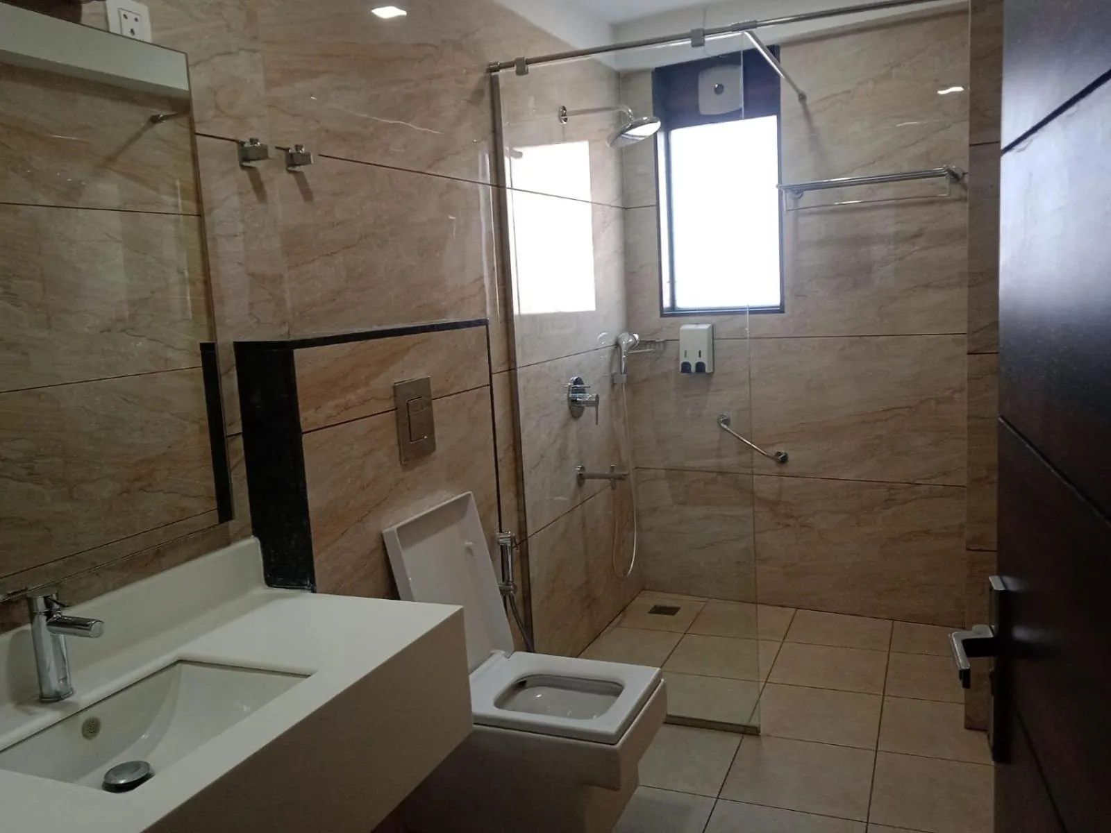 Bathroom in Sai Maa Hotel & Residency