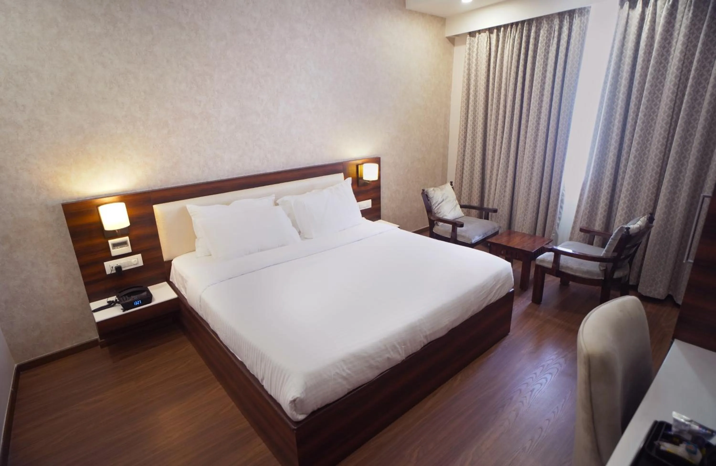 Bedroom, Bed in Sai Maa Hotel & Residency