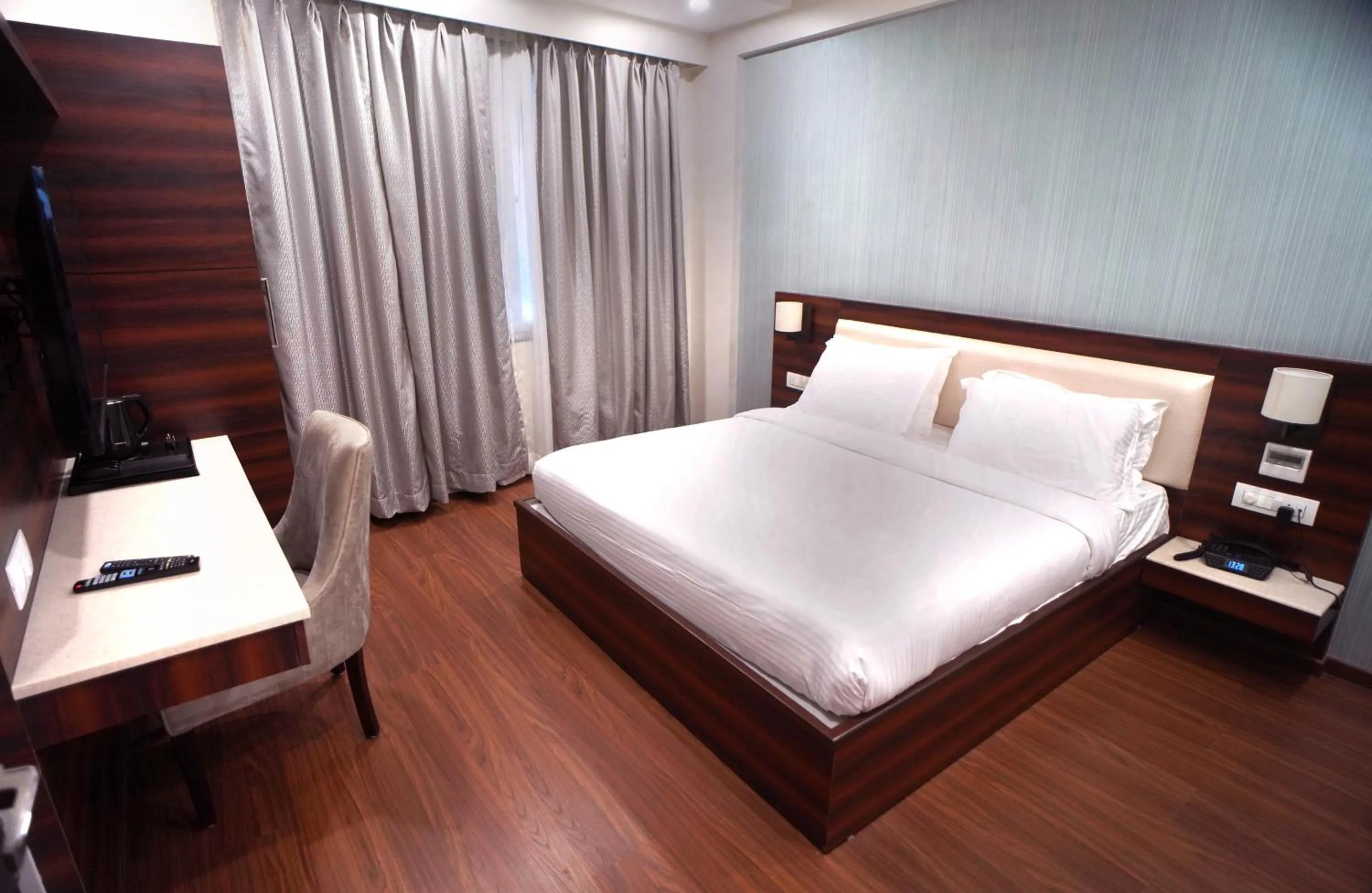 Bedroom, Bed in Sai Maa Hotel & Residency